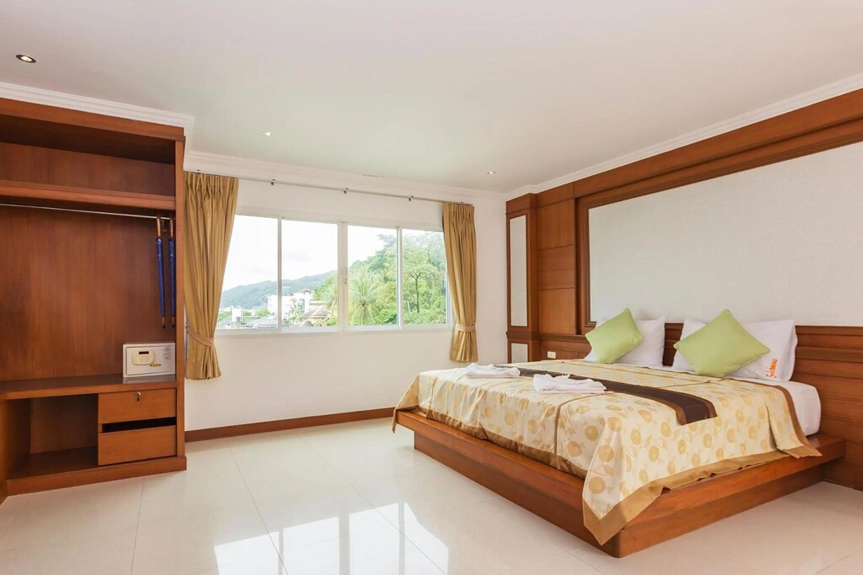 Bed in Sukcheewa Residence Phuket