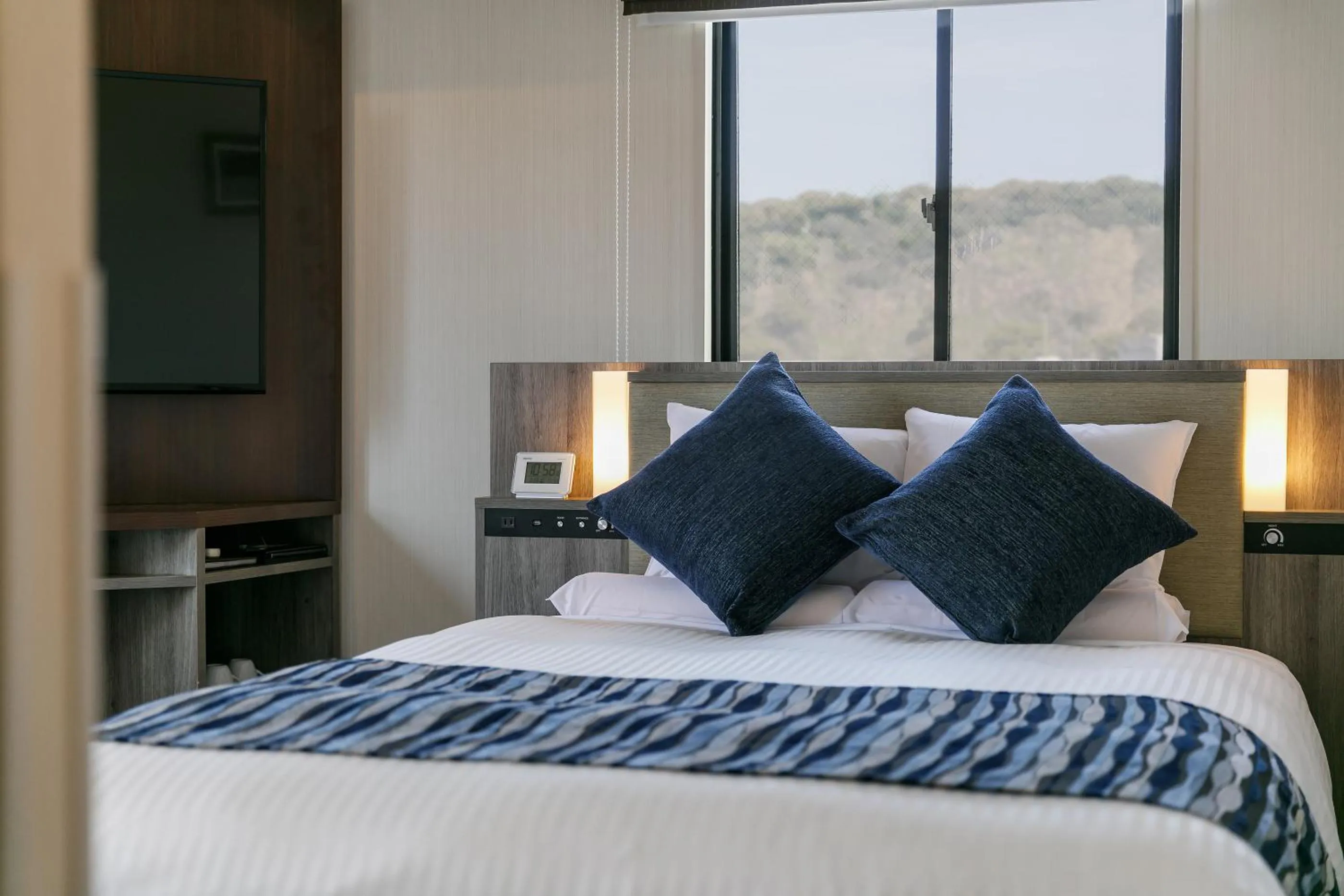 Bed in Hotel Mystays Kagoshima Tenmonkan Annex