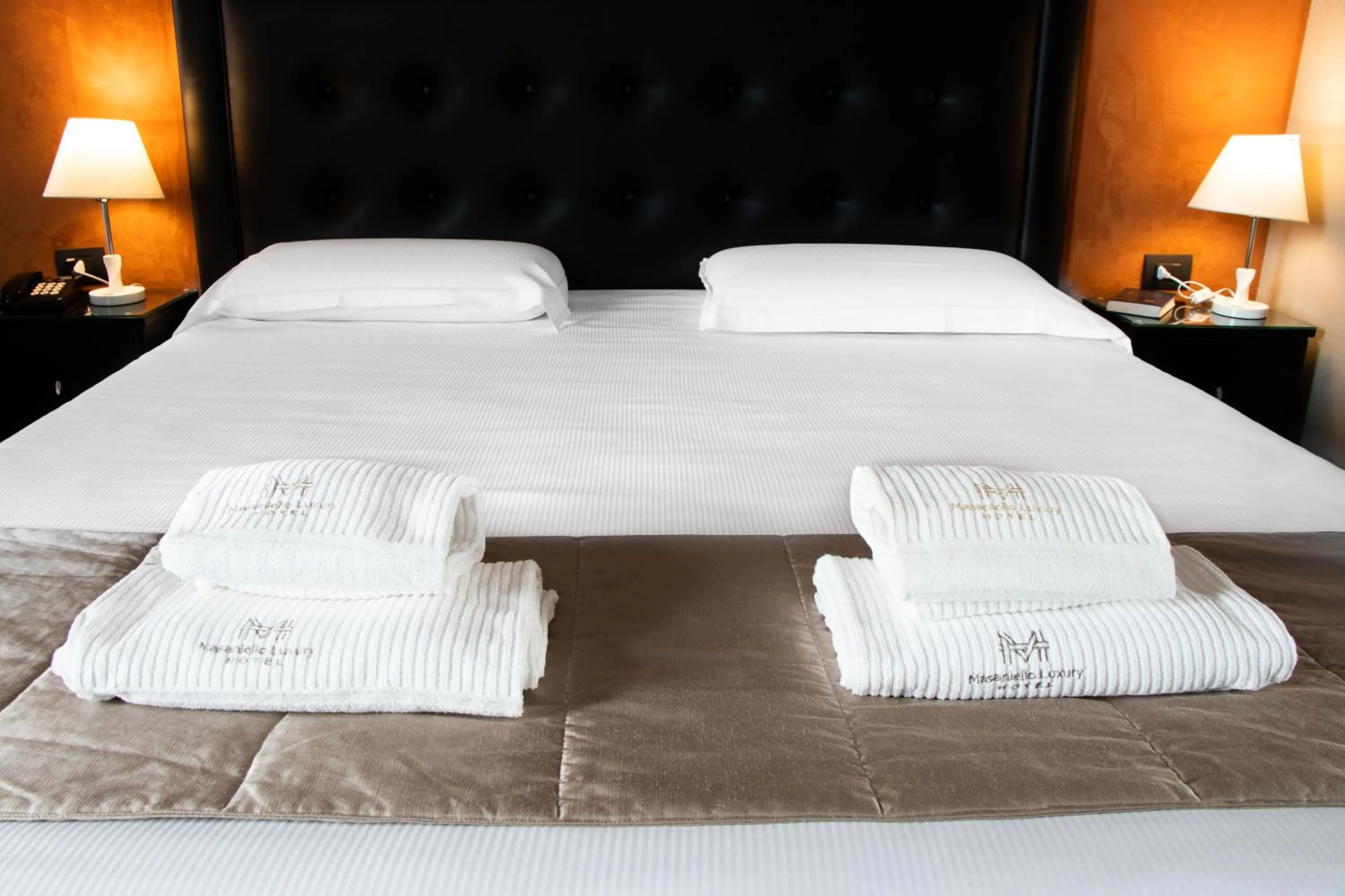 Bed in Hotel Masaniello Luxury