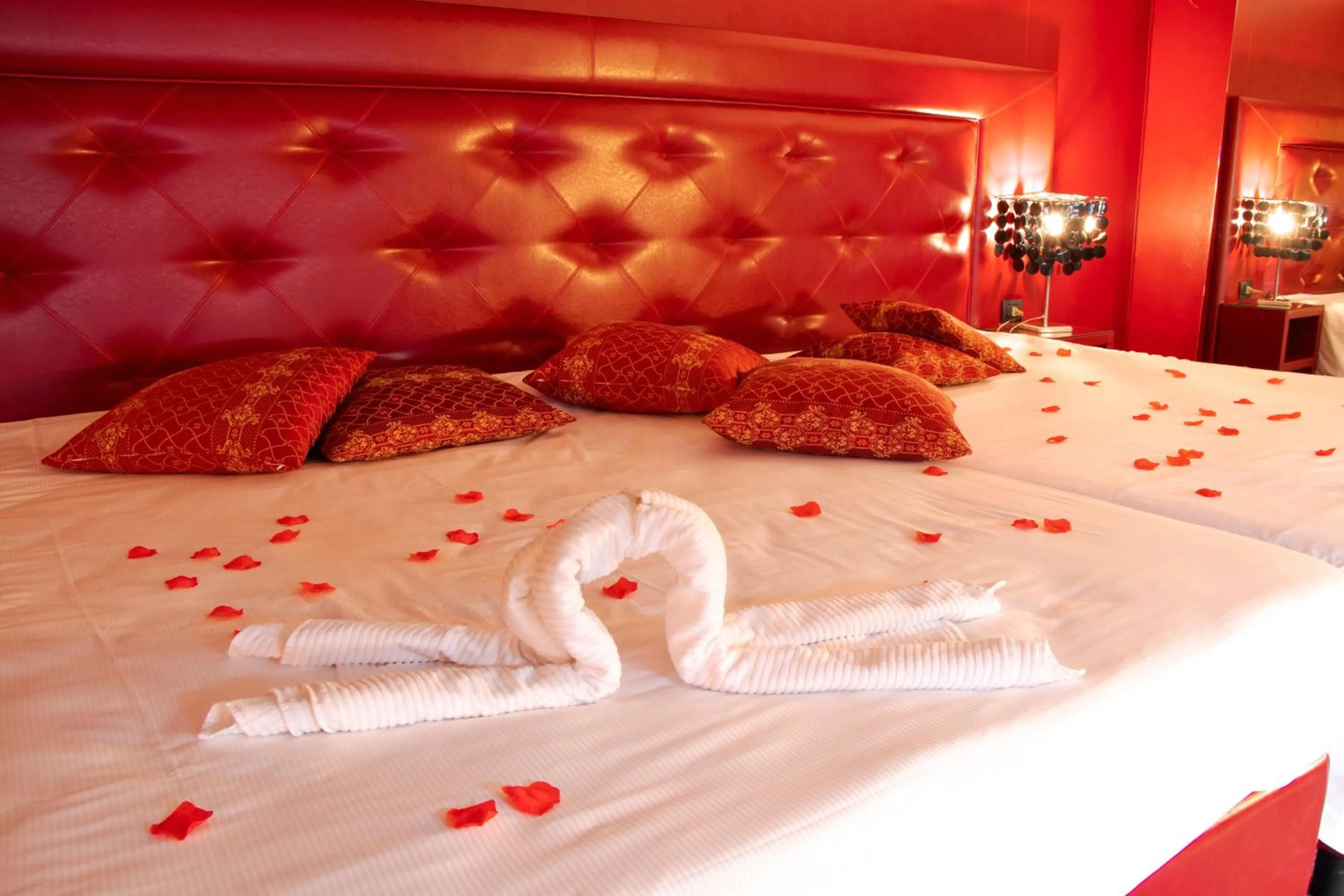 Bed in Hotel Masaniello Luxury