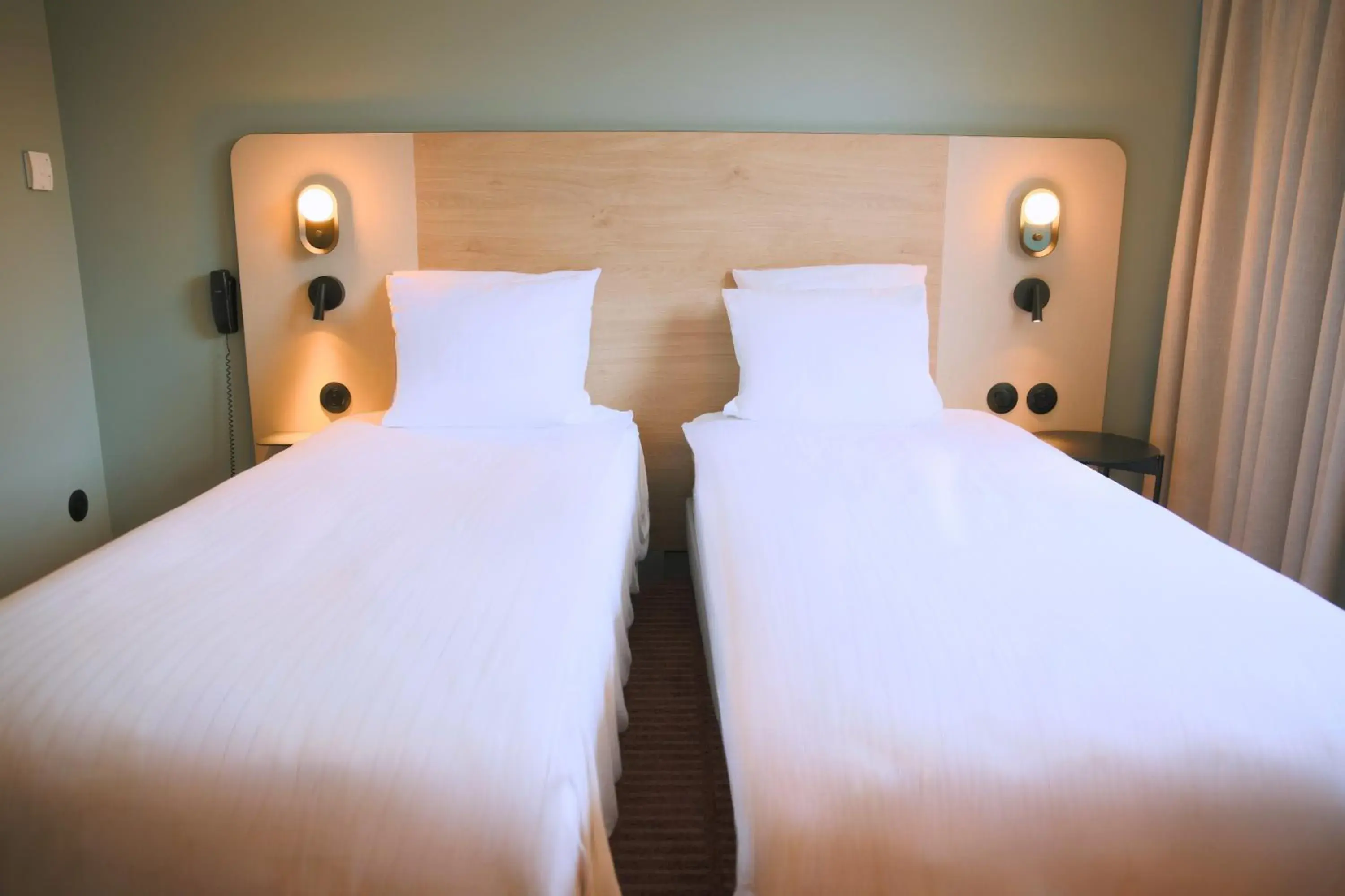 Bed in Logis Hotel L'Ours de Mutzig Bed in Logis Hotel L'Ours de Mutzig