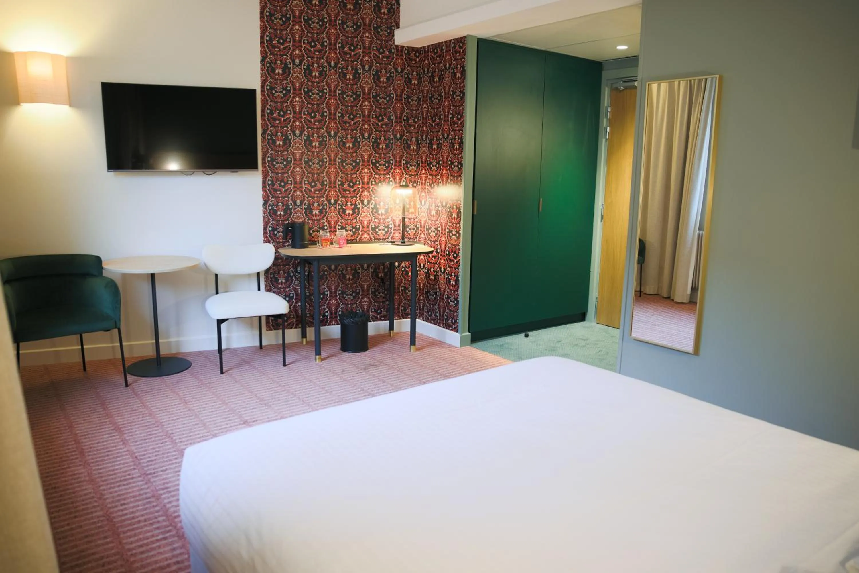 Photo of the whole room, Bed in Logis Hotel L'Ours de Mutzig