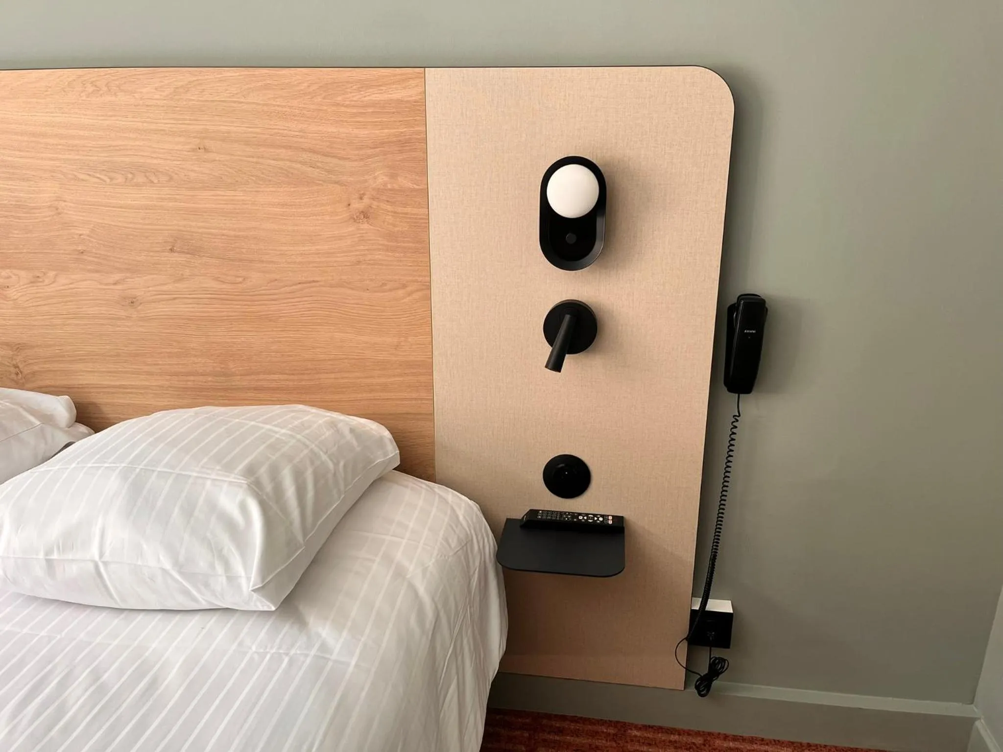 Bed in Logis Hotel L'Ours de Mutzig