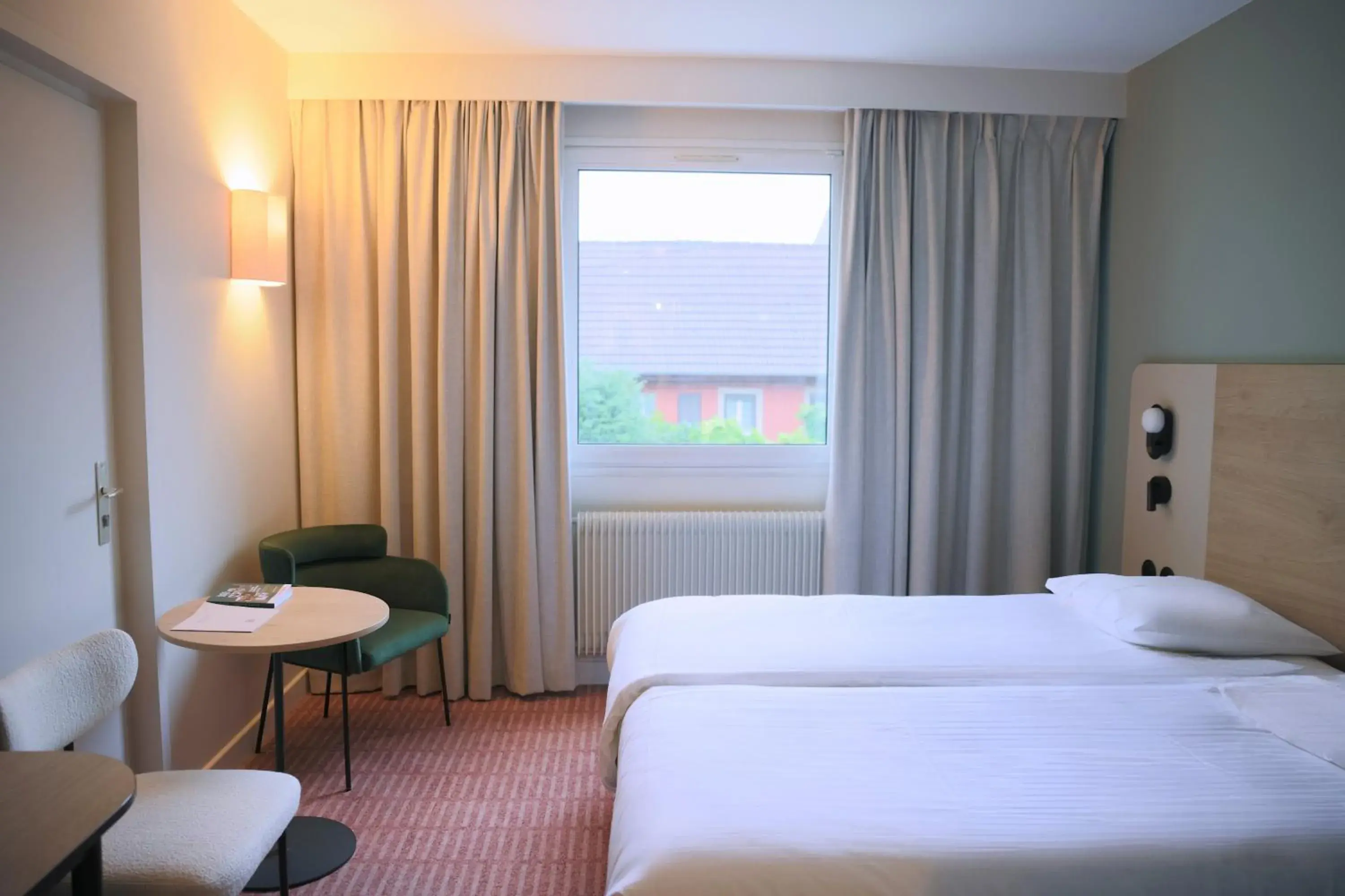 Bed in Logis Hotel L'Ours de Mutzig Bed in Logis Hotel L'Ours de Mutzig