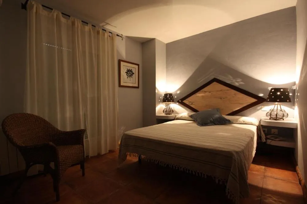 Bed in Posada Tresmentiras