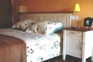 Bed in Posada Tresmentiras