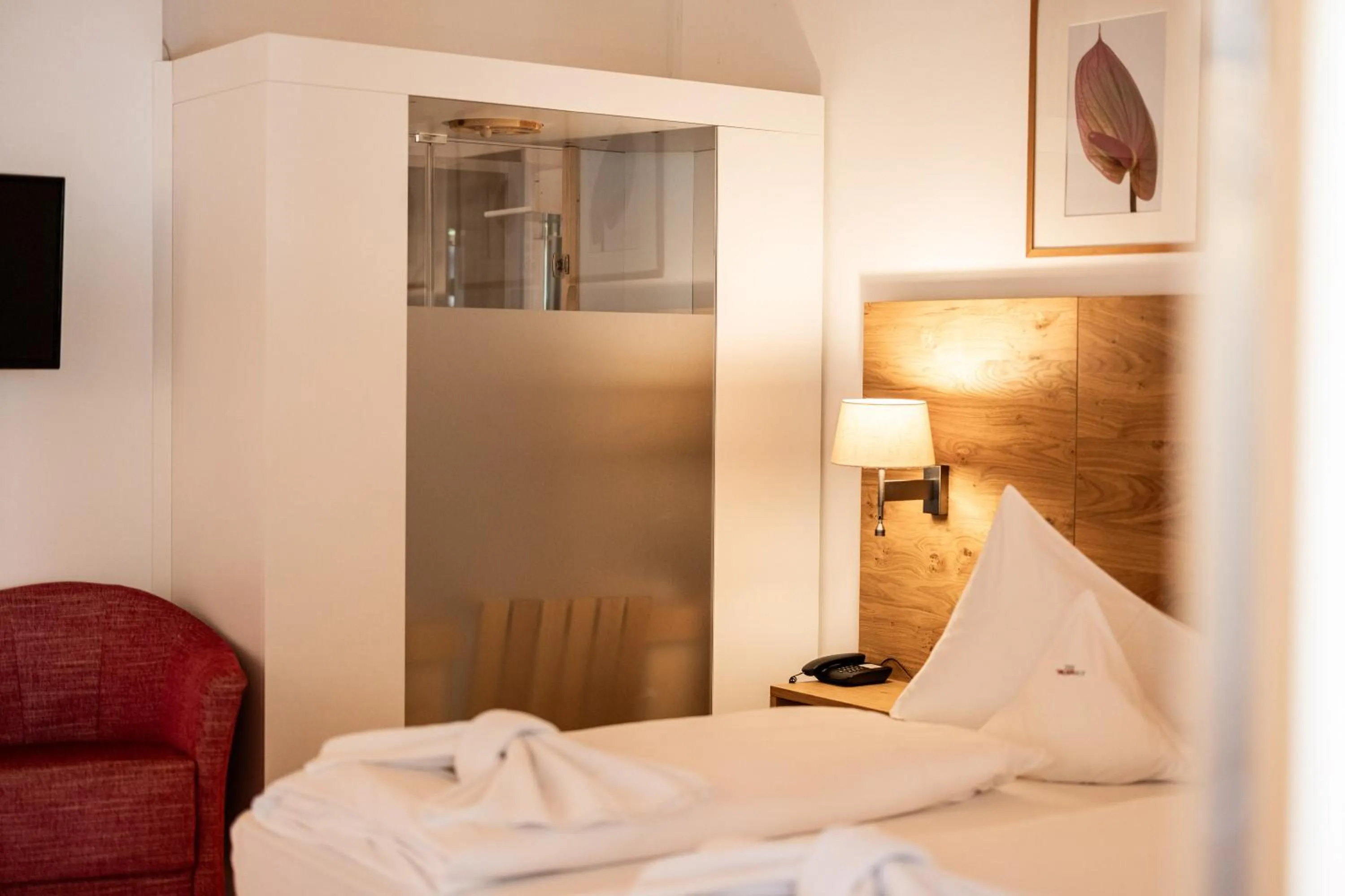 Bedroom, Bed in Parkhotel Tirolerhof