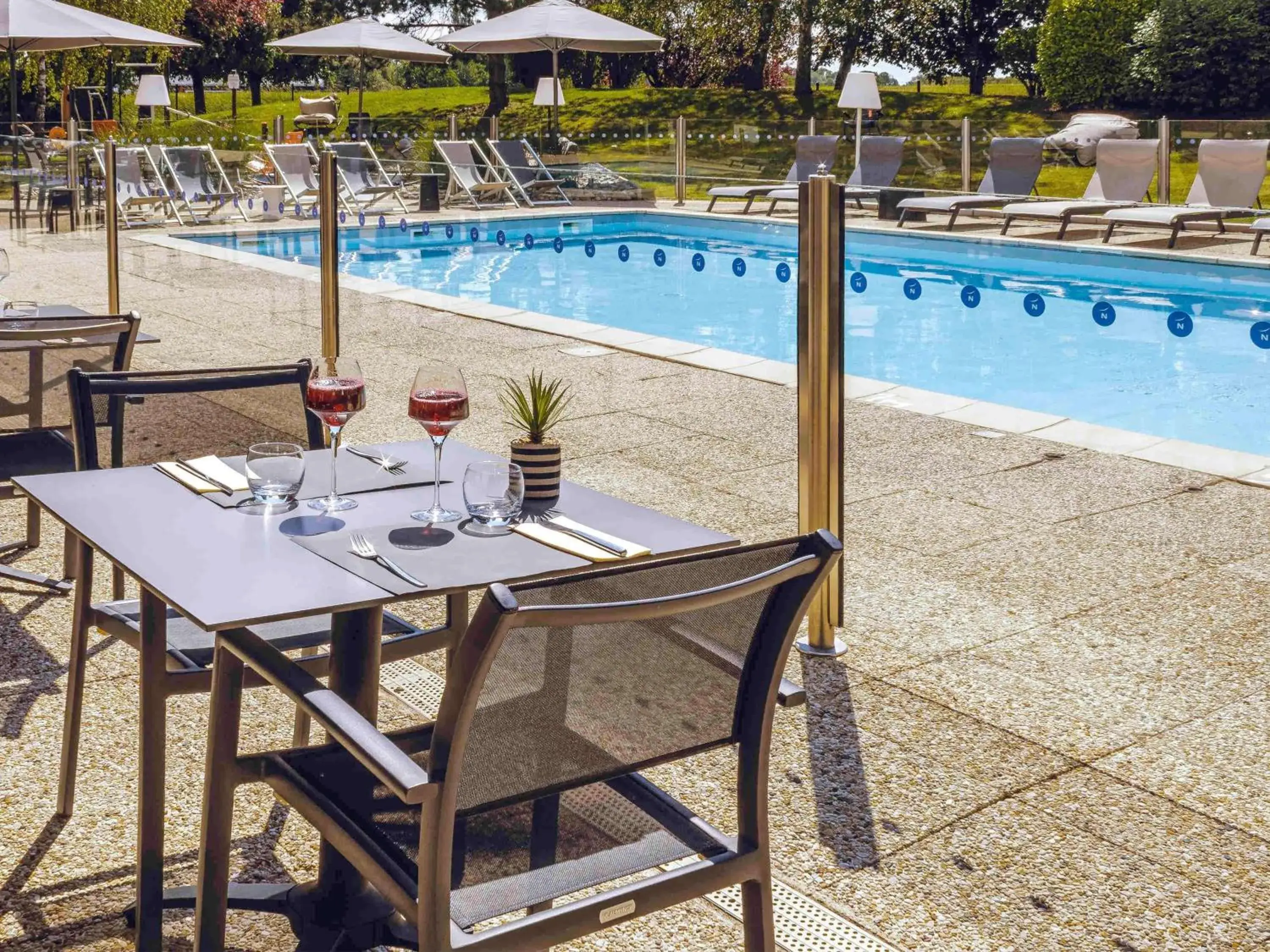 Pool view in Novotel Beaune Pool view in Novotel Beaune