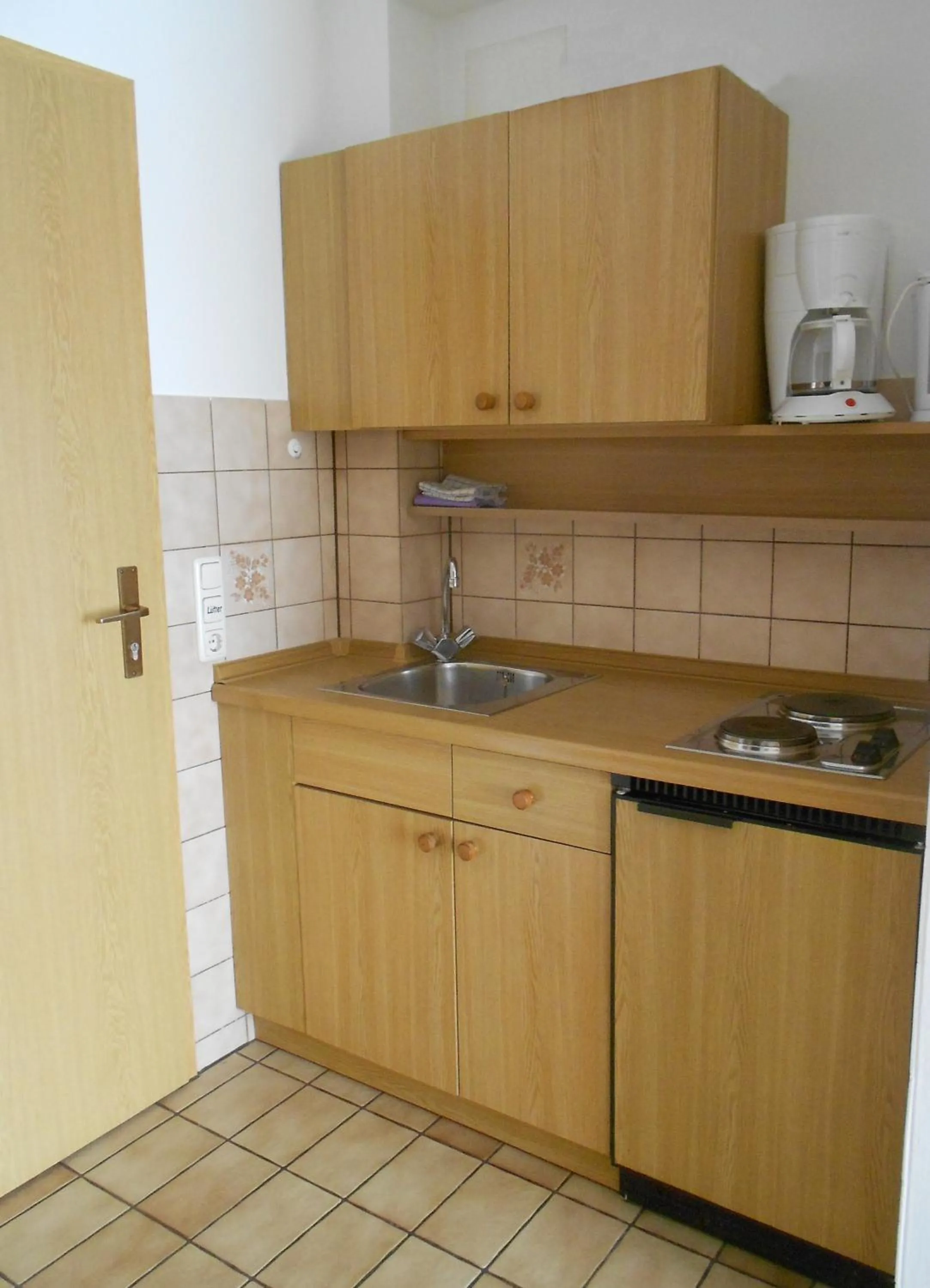 Kitchen or kitchenette in Hotel Fortuna