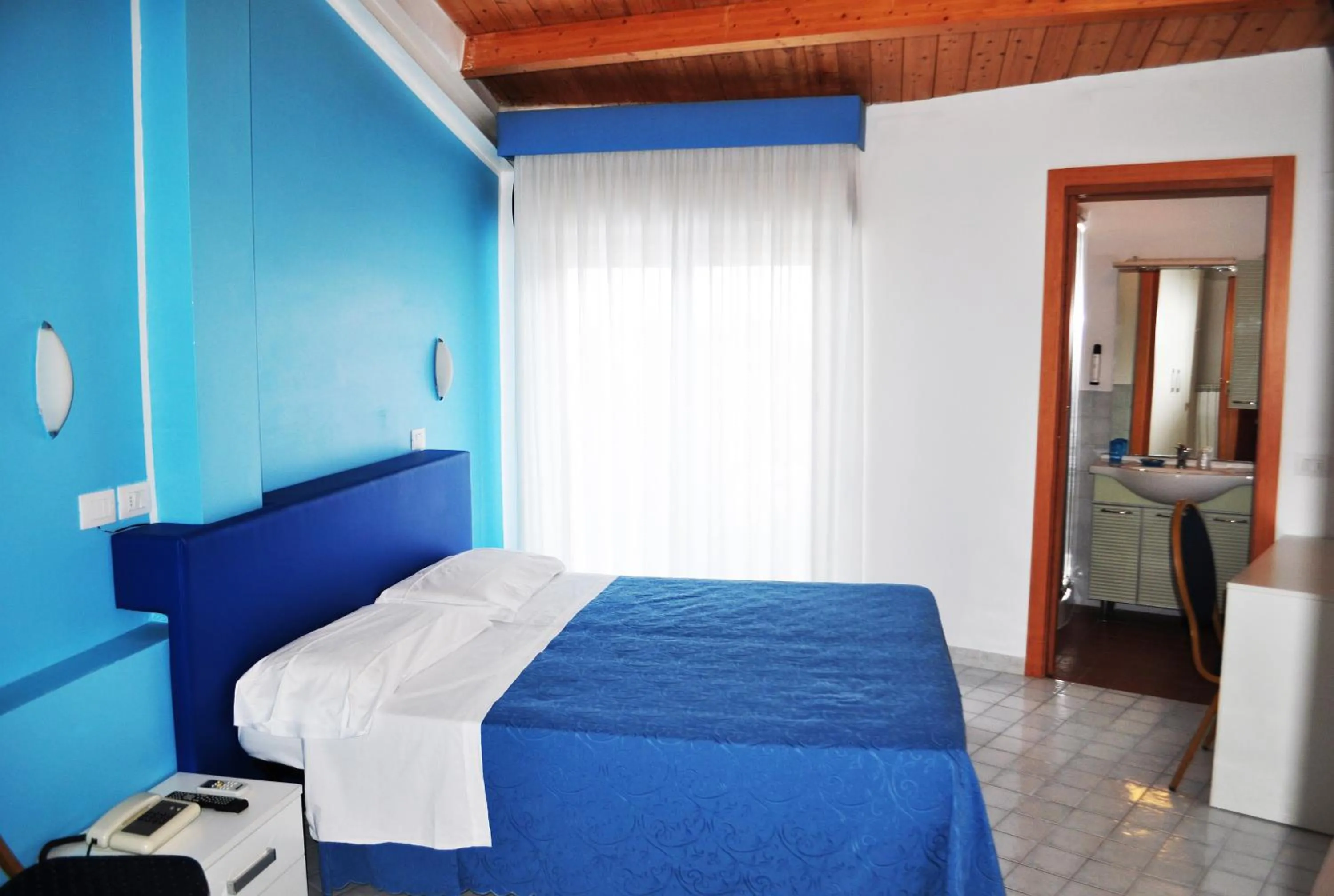 Bed in Hotel Albatros