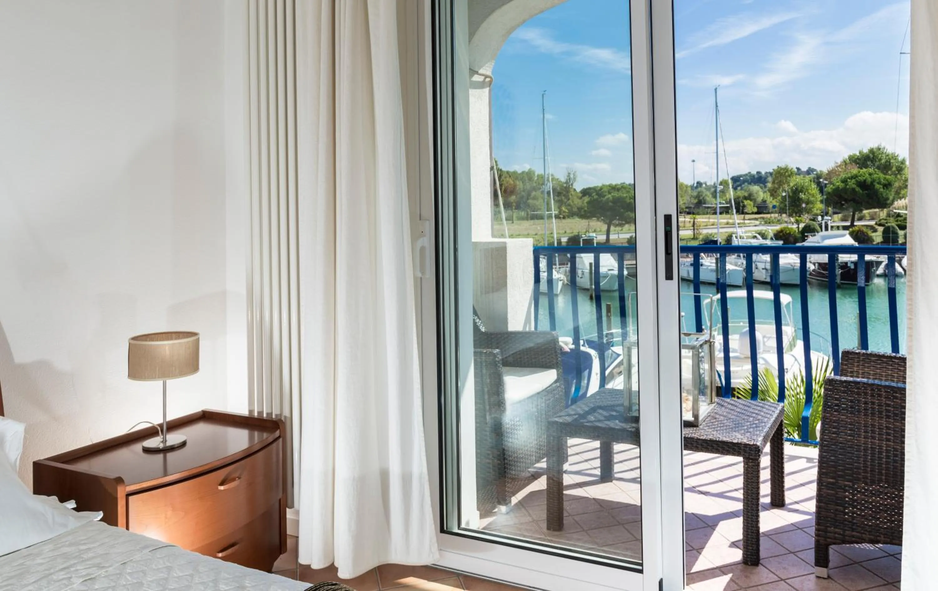 Bed in Portoverde Beach Apartments