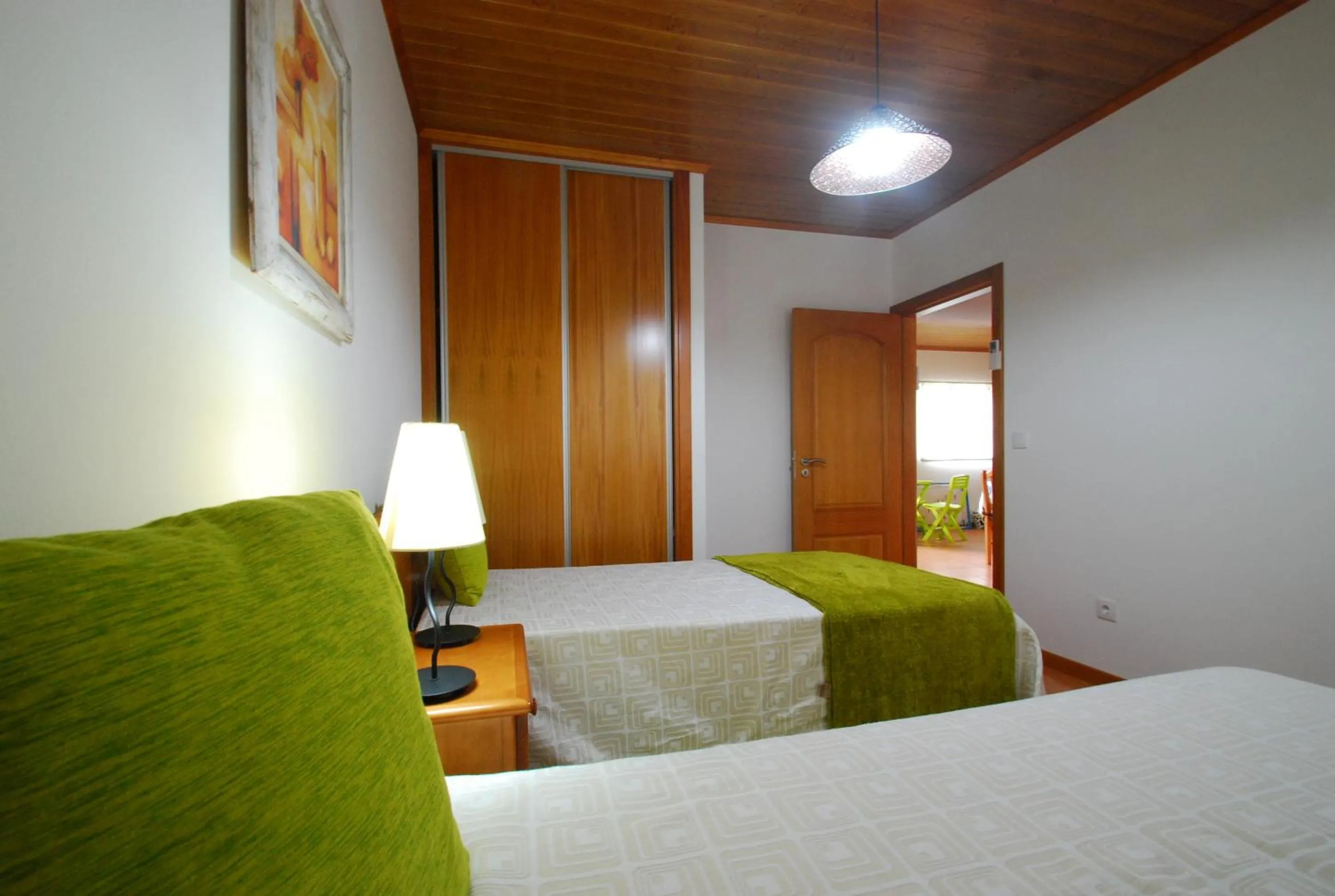 Photo of the whole room, Bed in Alojamentos Flores Island