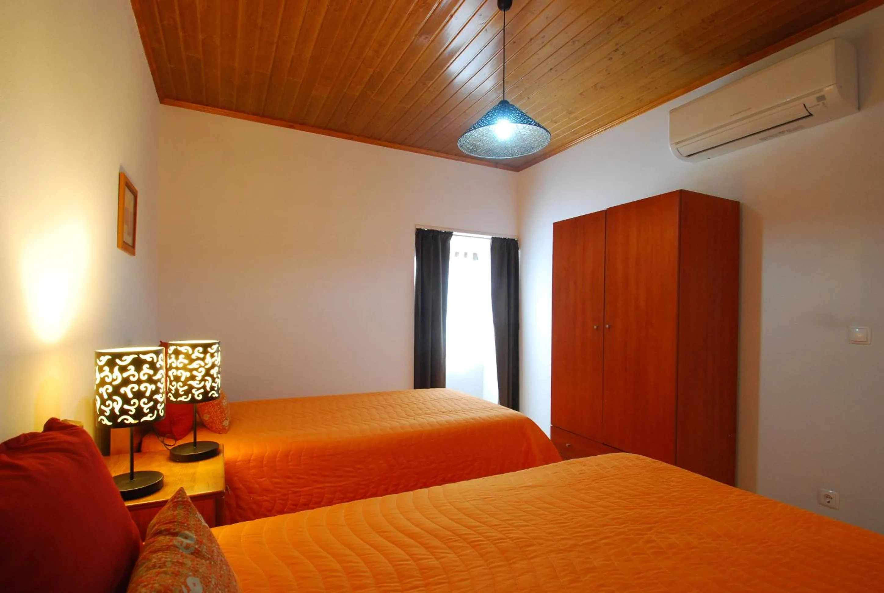 Photo of the whole room, Bed in Alojamentos Flores Island