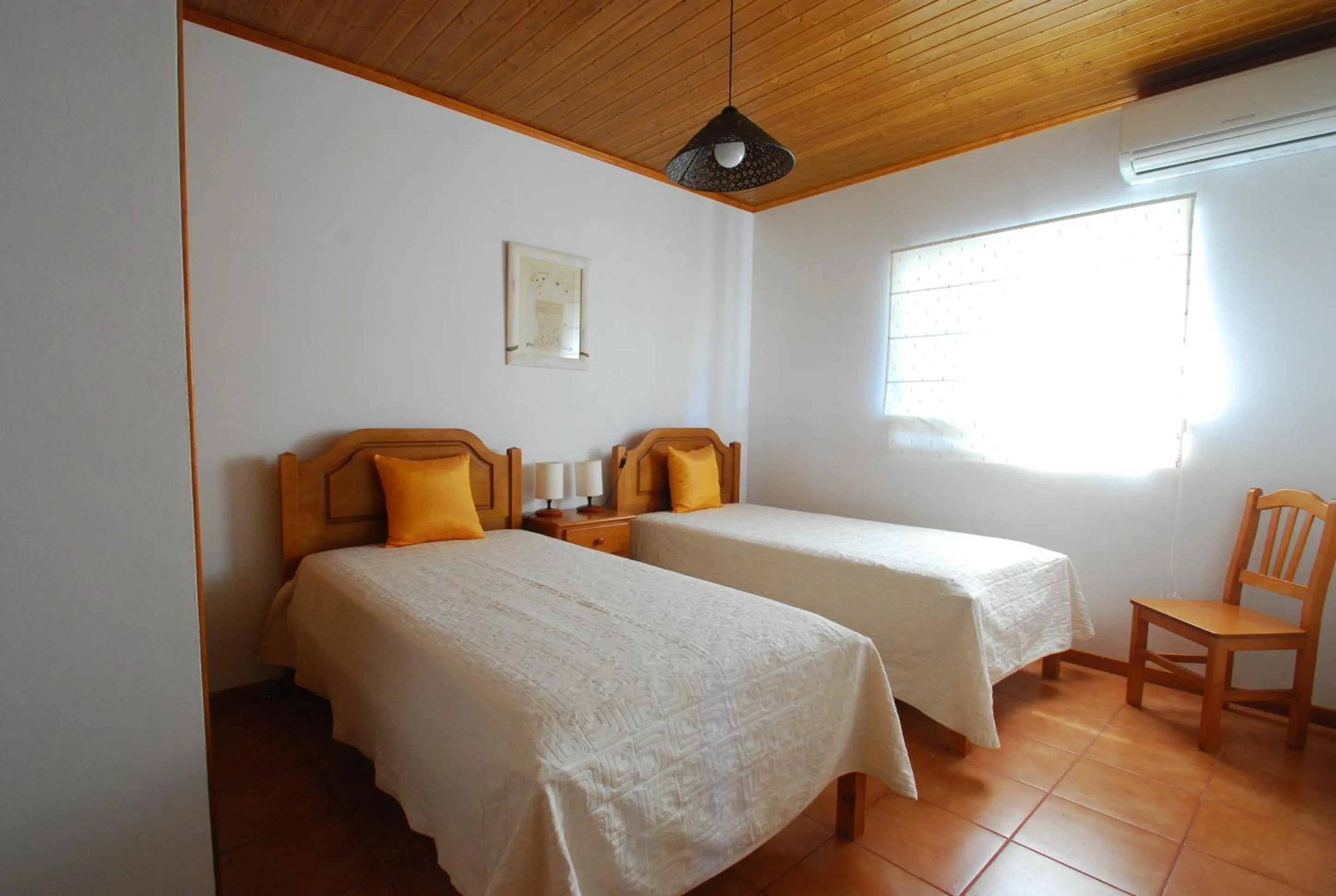 Photo of the whole room, Bed in Alojamentos Flores Island