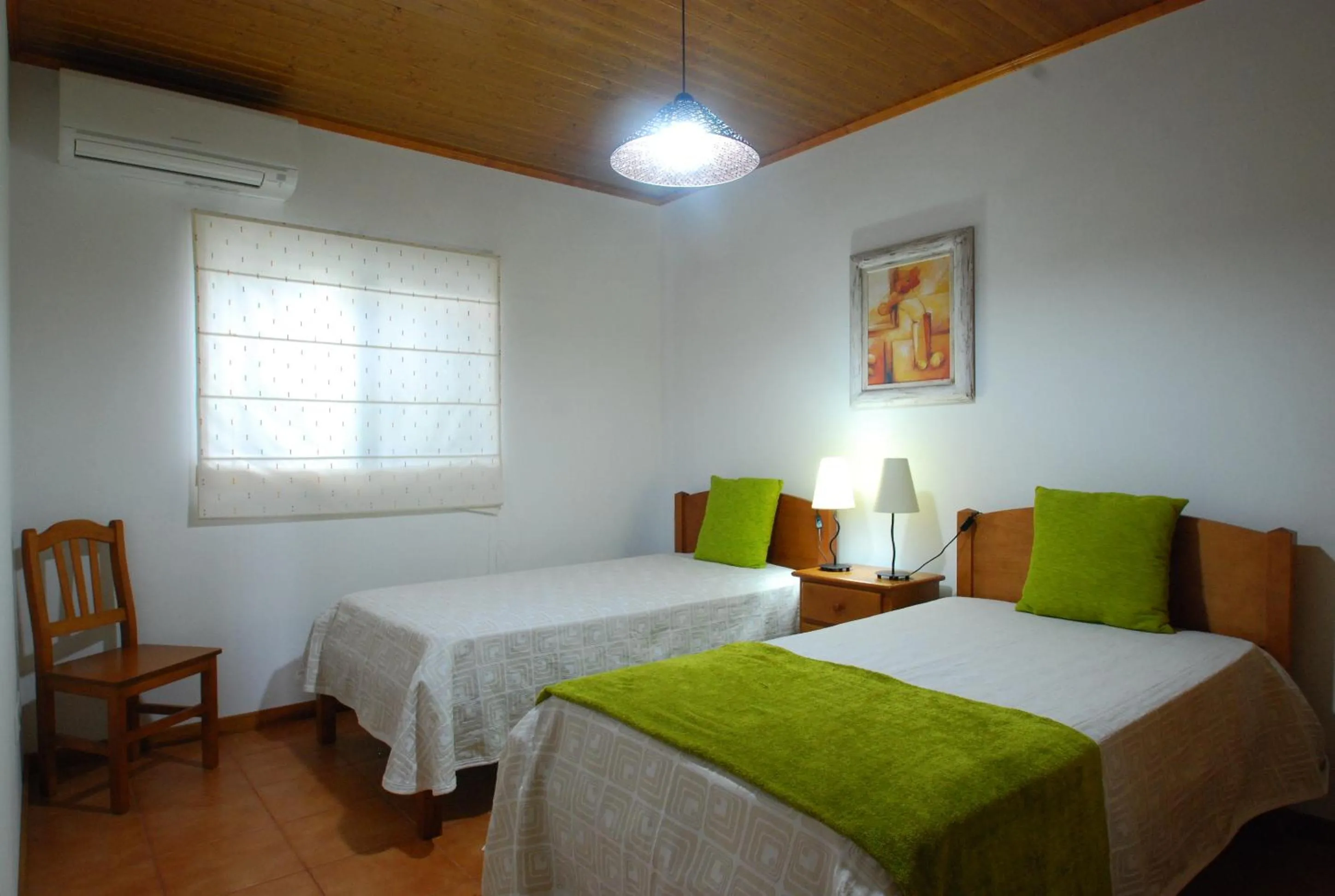 Photo of the whole room, Bed in Alojamentos Flores Island