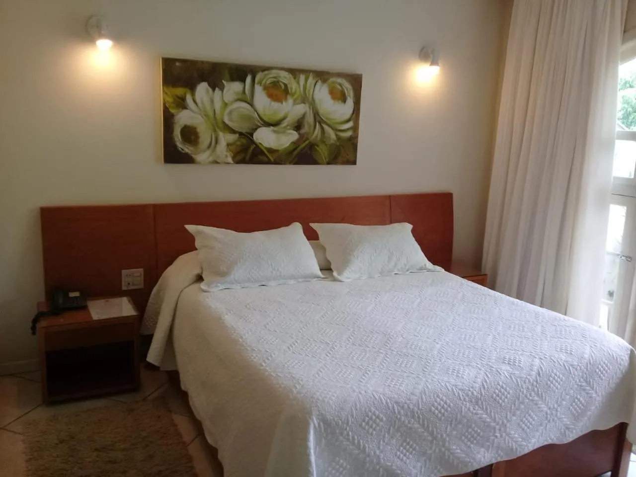 Bed in Hotel Dominguez Master