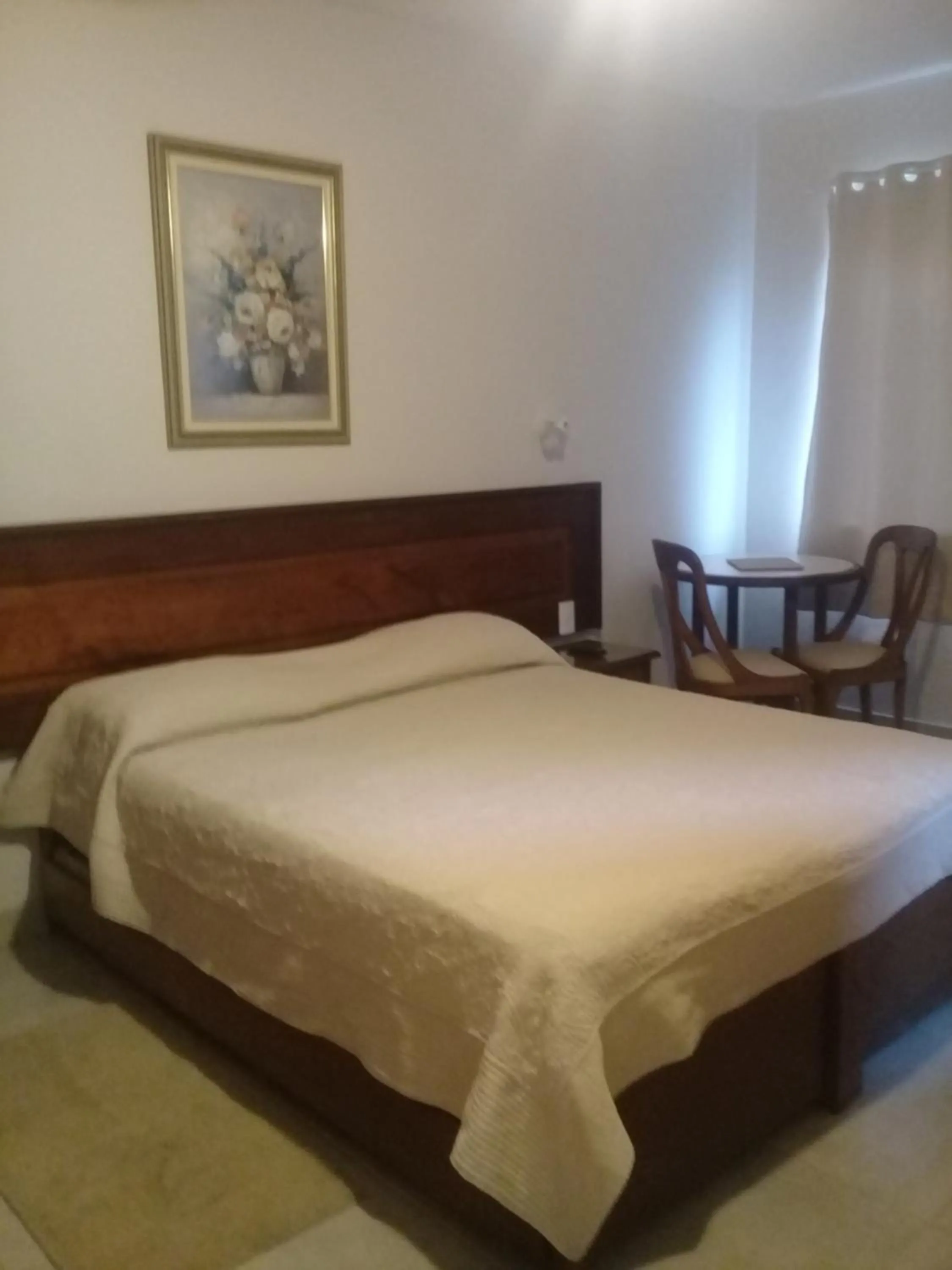 Bed in Hotel Dominguez Master