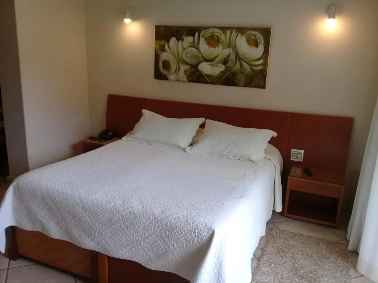 Bed in Hotel Dominguez Master