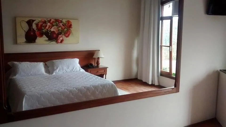 Bed in Hotel Dominguez Master