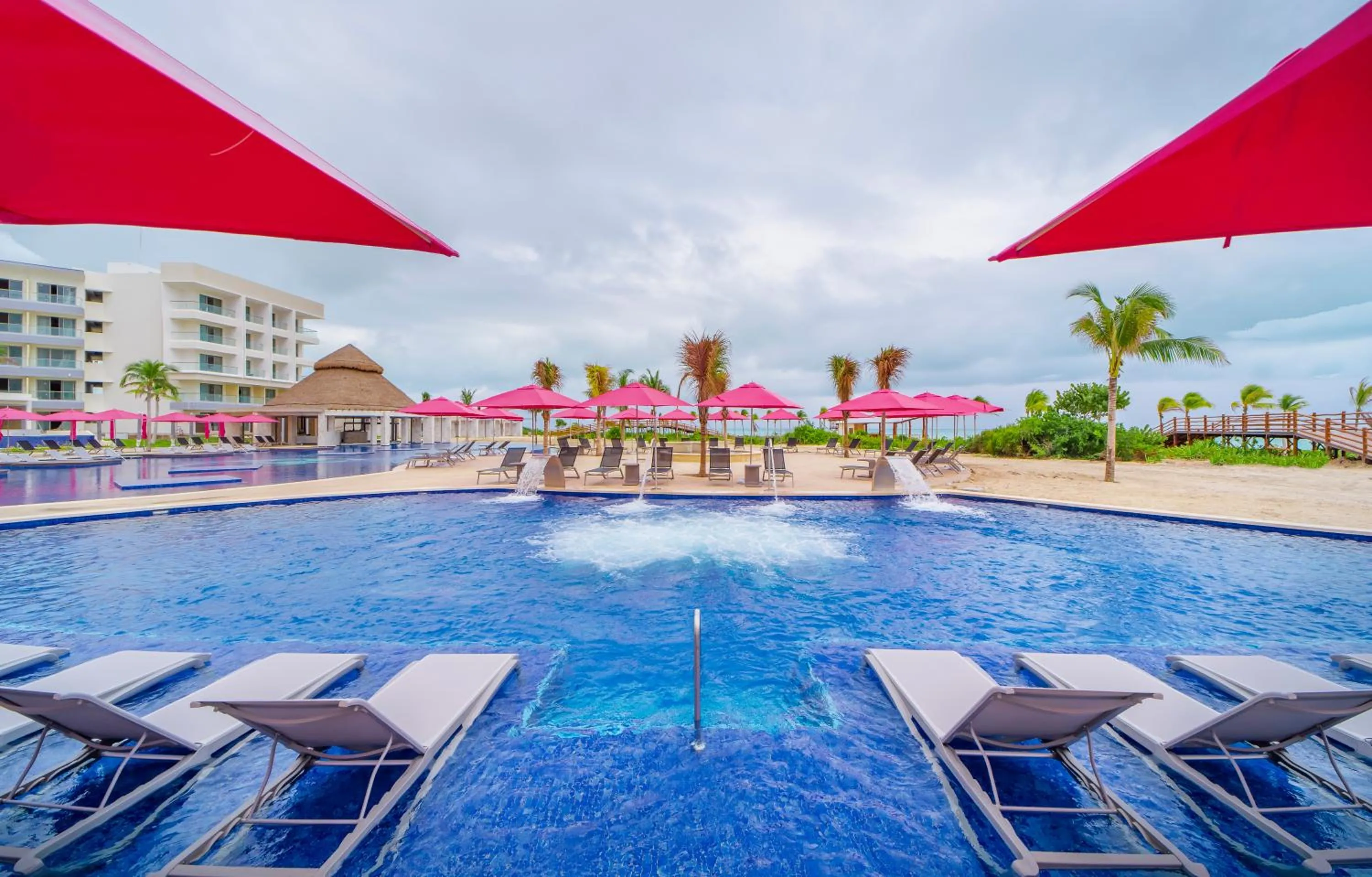Swimming pool in Planet Hollywood Cancun Adult Scene by Royalton, An Autograph Collection All-Inclusive Resort - Adults Only
