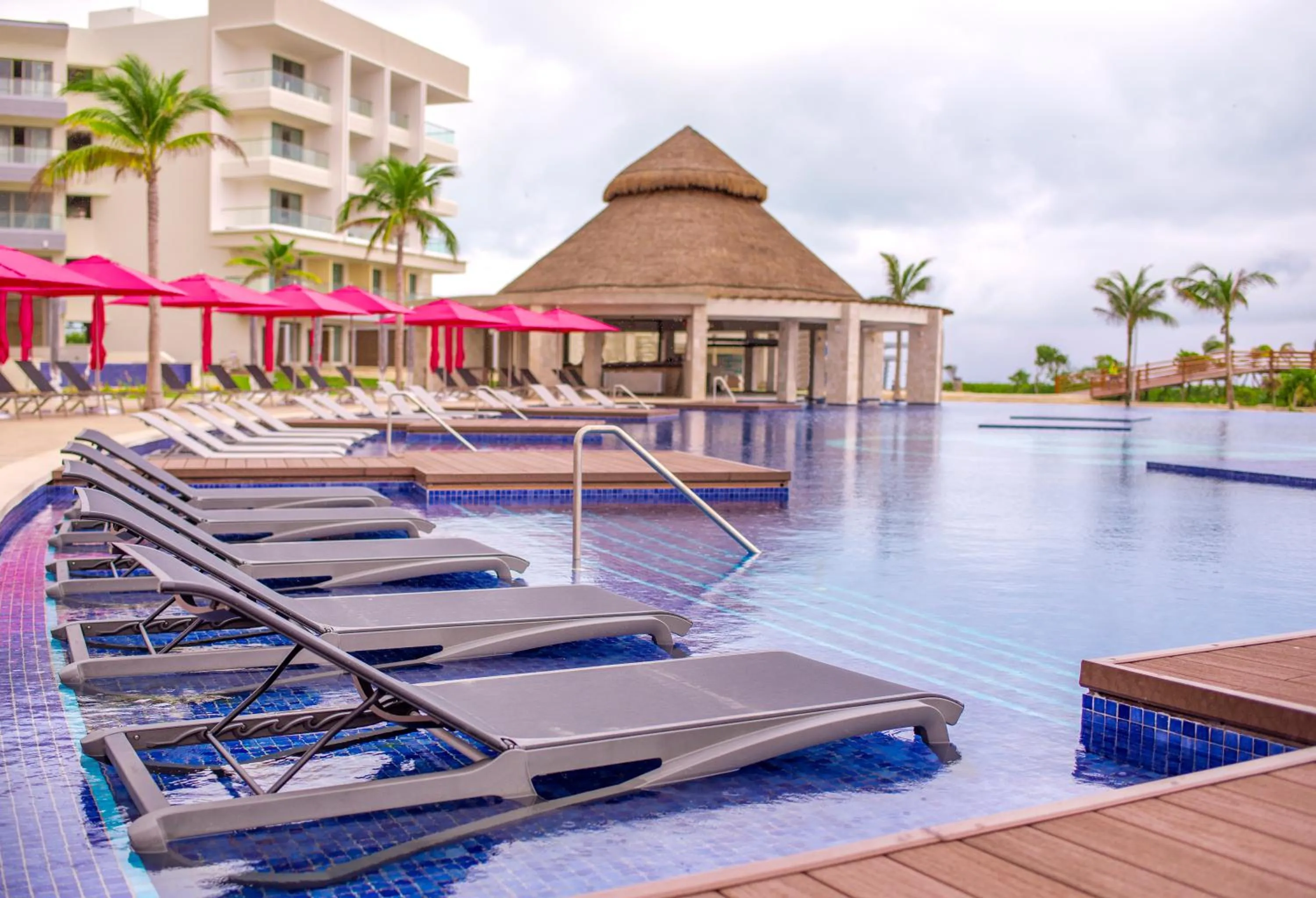 Swimming pool in Planet Hollywood Cancun Adult Scene by Royalton, An Autograph Collection All-Inclusive Resort - Adults Only