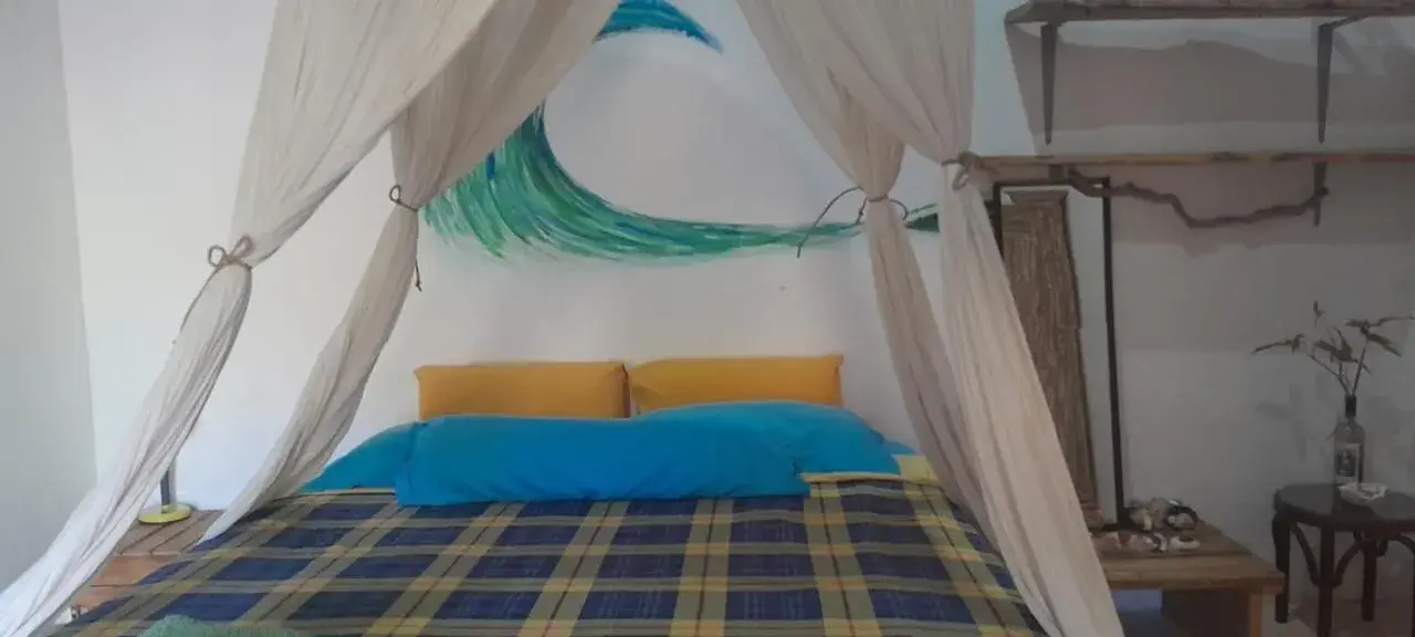 Queen Room with Garden View in Blu oceano B&B, Italian restaurant Queen Room with Garden View in Blu oceano B&B, Italian restaurant
