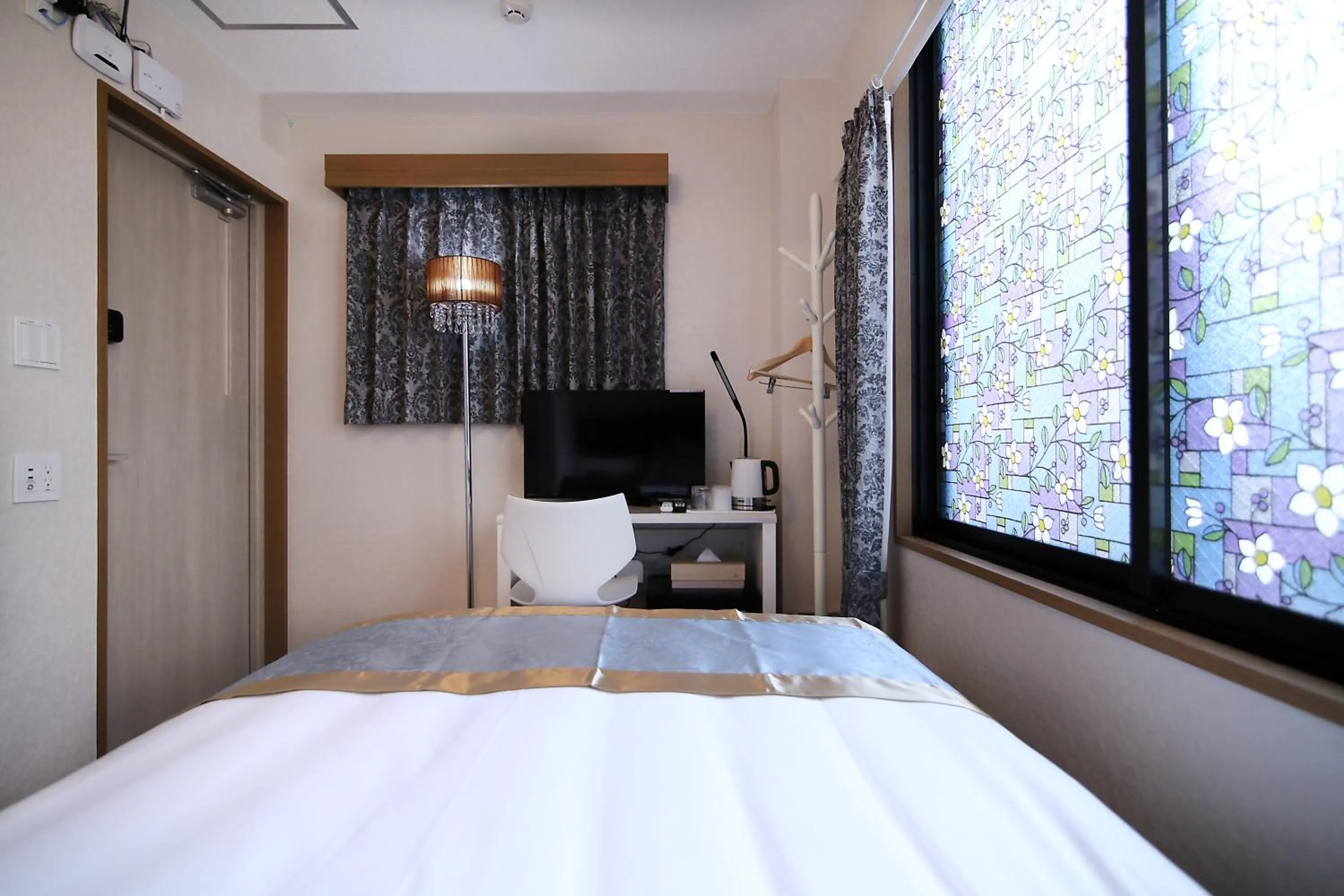 Bed in SHINJUKU GLOBAL HOTEL