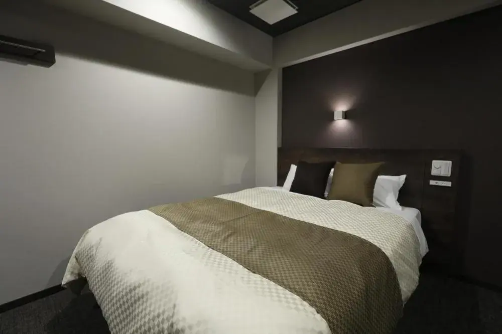 Bed in The Celecton Tsuchiura Ekimae Bed in The Celecton Tsuchiura Ekimae