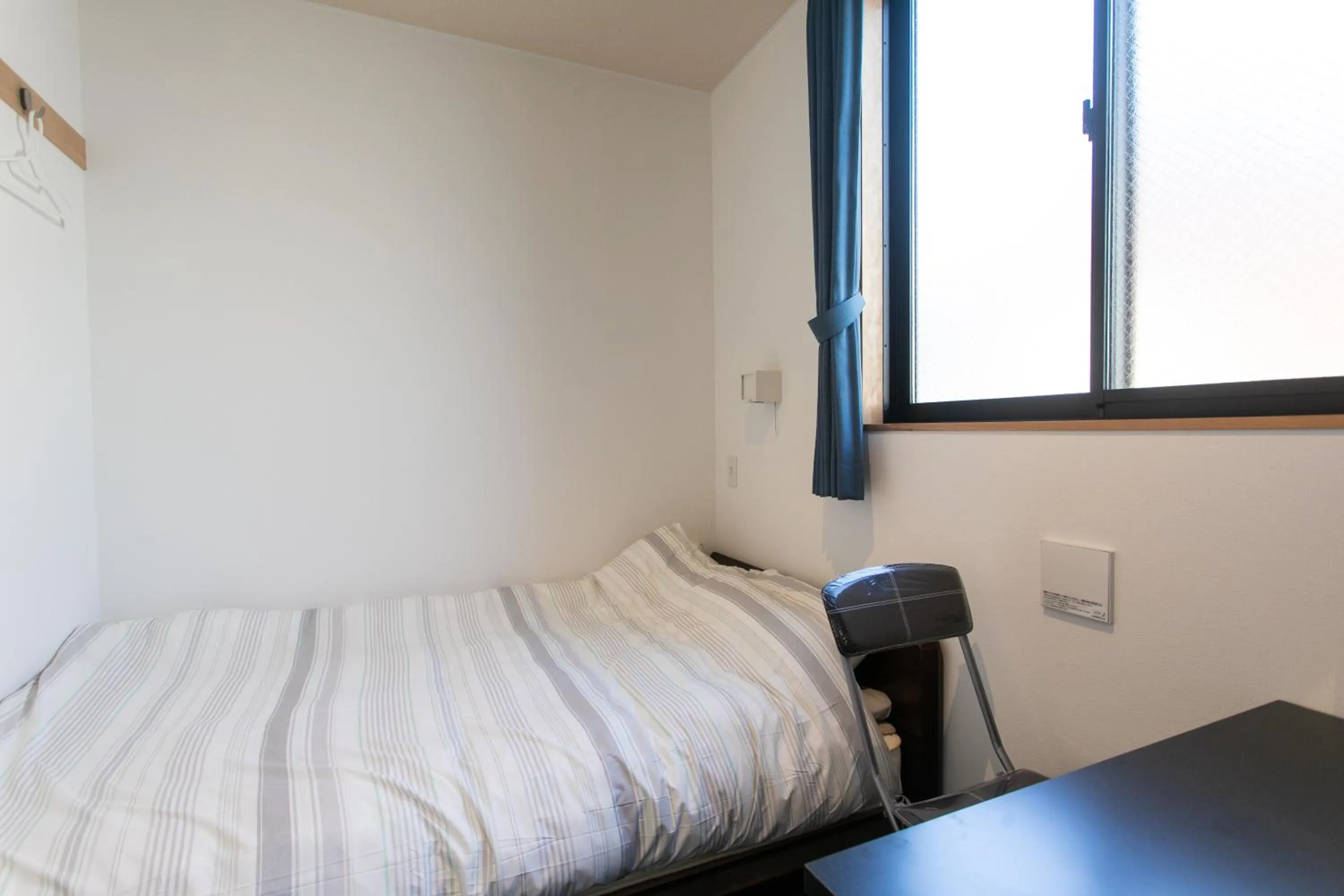 Photo of the whole room, Bed in Hostel Takeyado