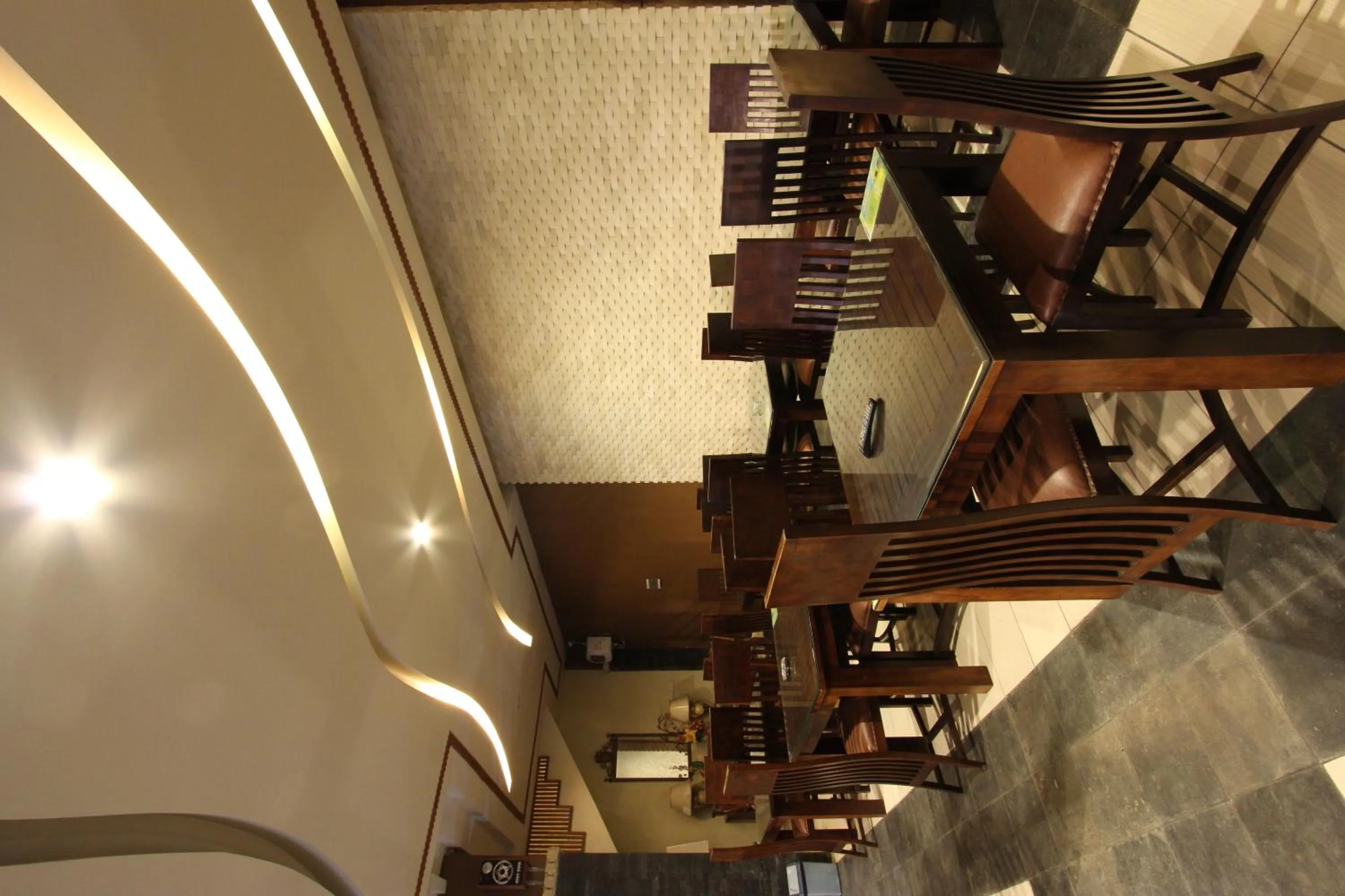 Seating area in griya desa hotel & pool