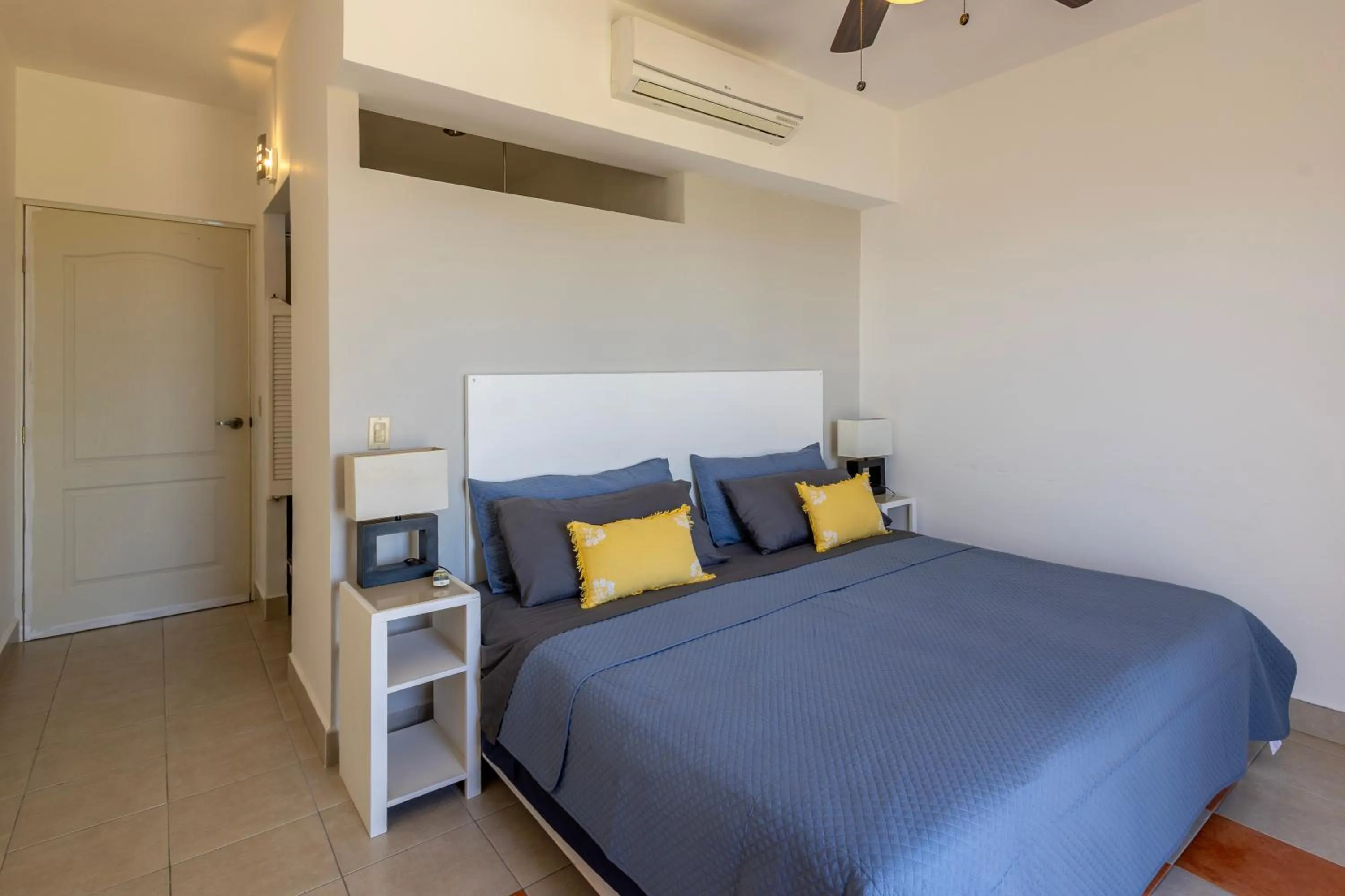 Bed in MariaMar Suites