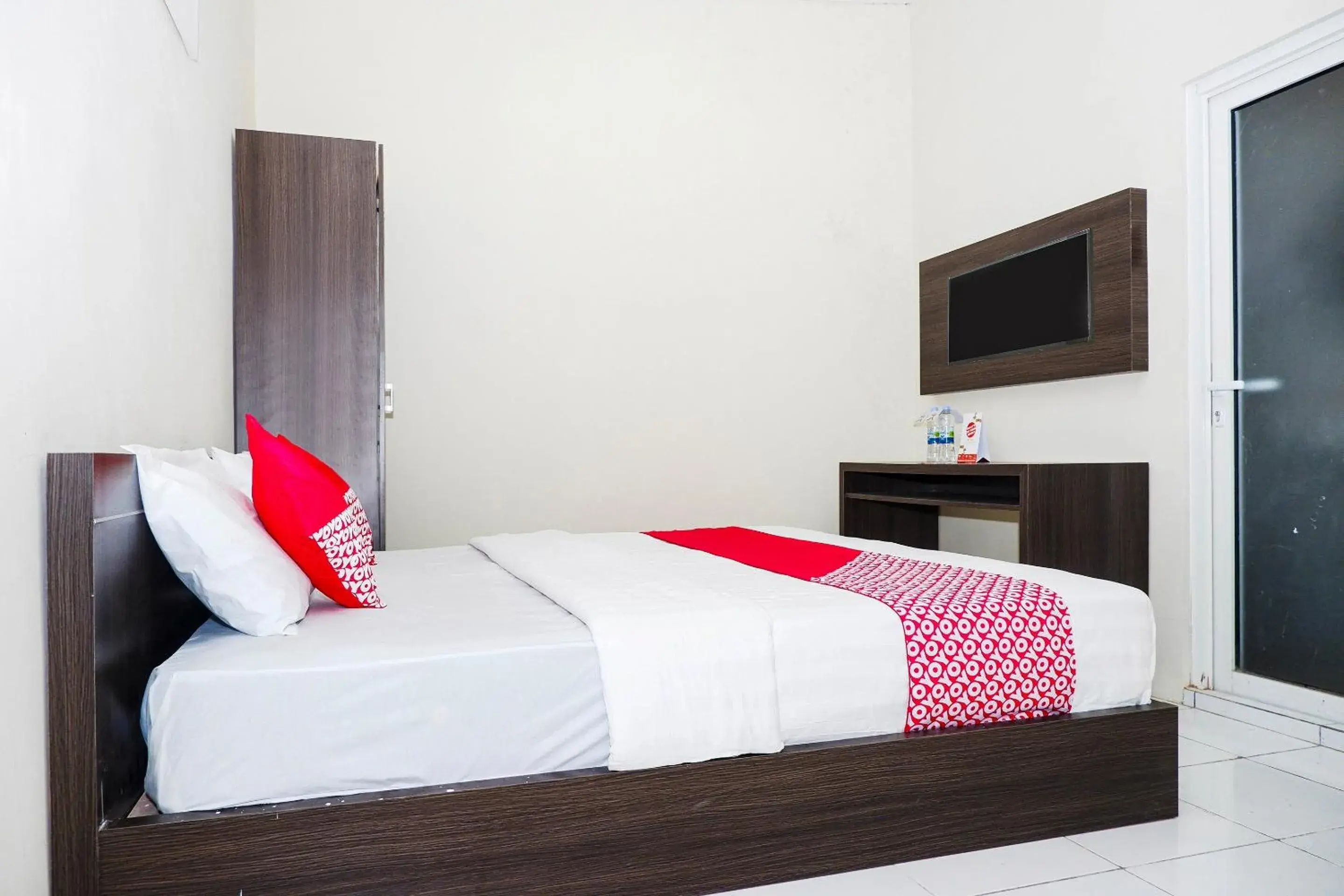 Bedroom in Hotel O Candi Residence Bedroom in Hotel O Candi Residence