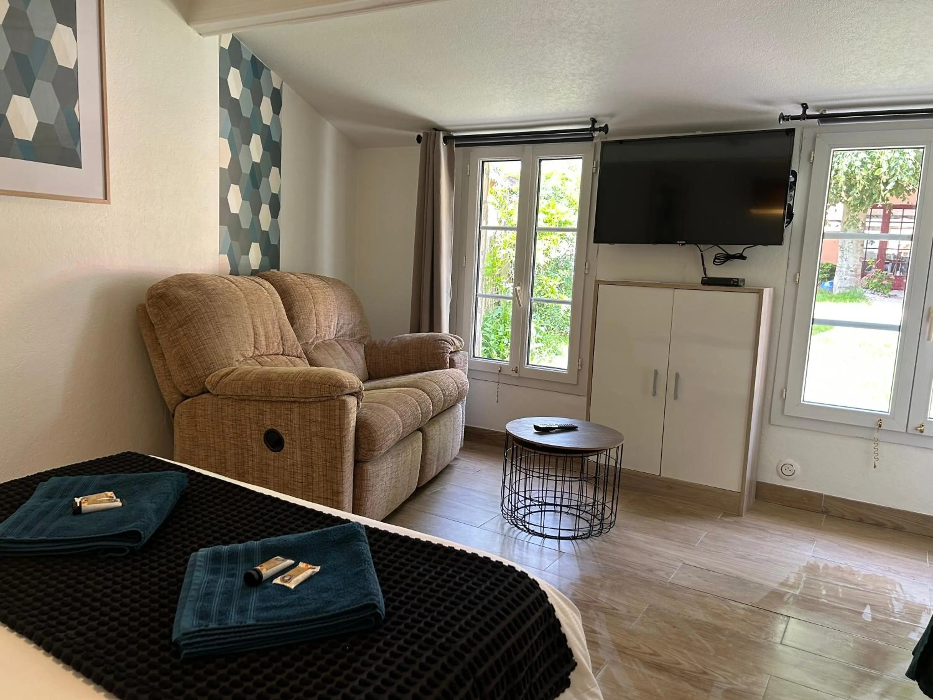 Seating area in Hôtel et Appart 'hôtel Chez Gino ETAPLES-Le Touquet