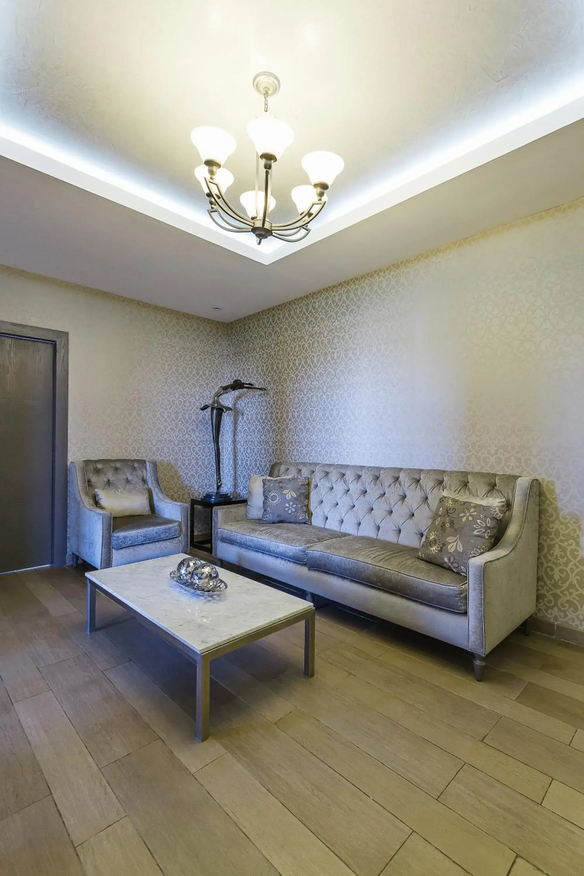 Living room in Hotel El Conquistador del Paseo de Montejo Living room in Hotel El Conquistador del Paseo de Montejo