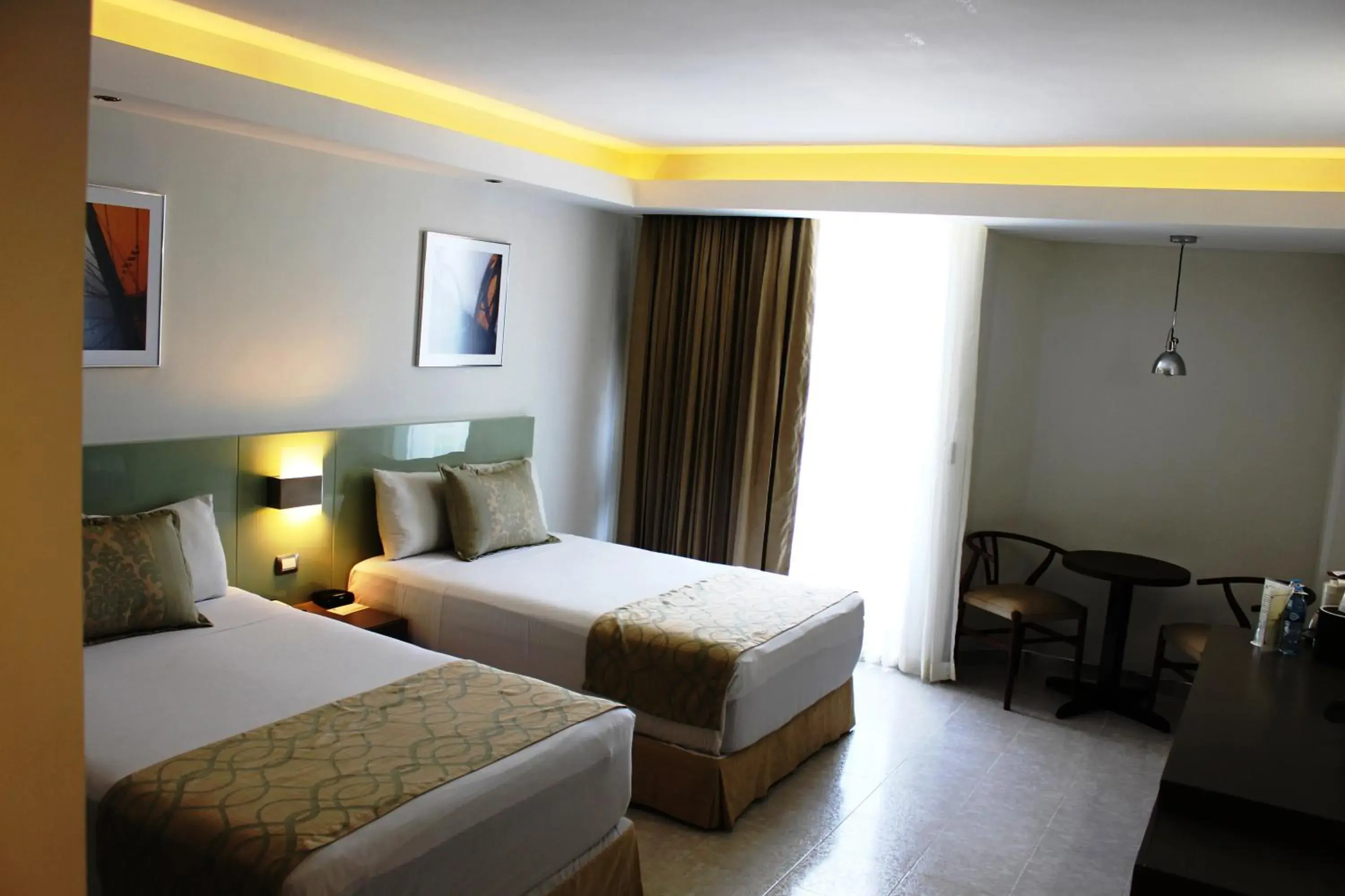 Day, Bed in Hotel El Conquistador del Paseo de Montejo Day, Bed in Hotel El Conquistador del Paseo de Montejo