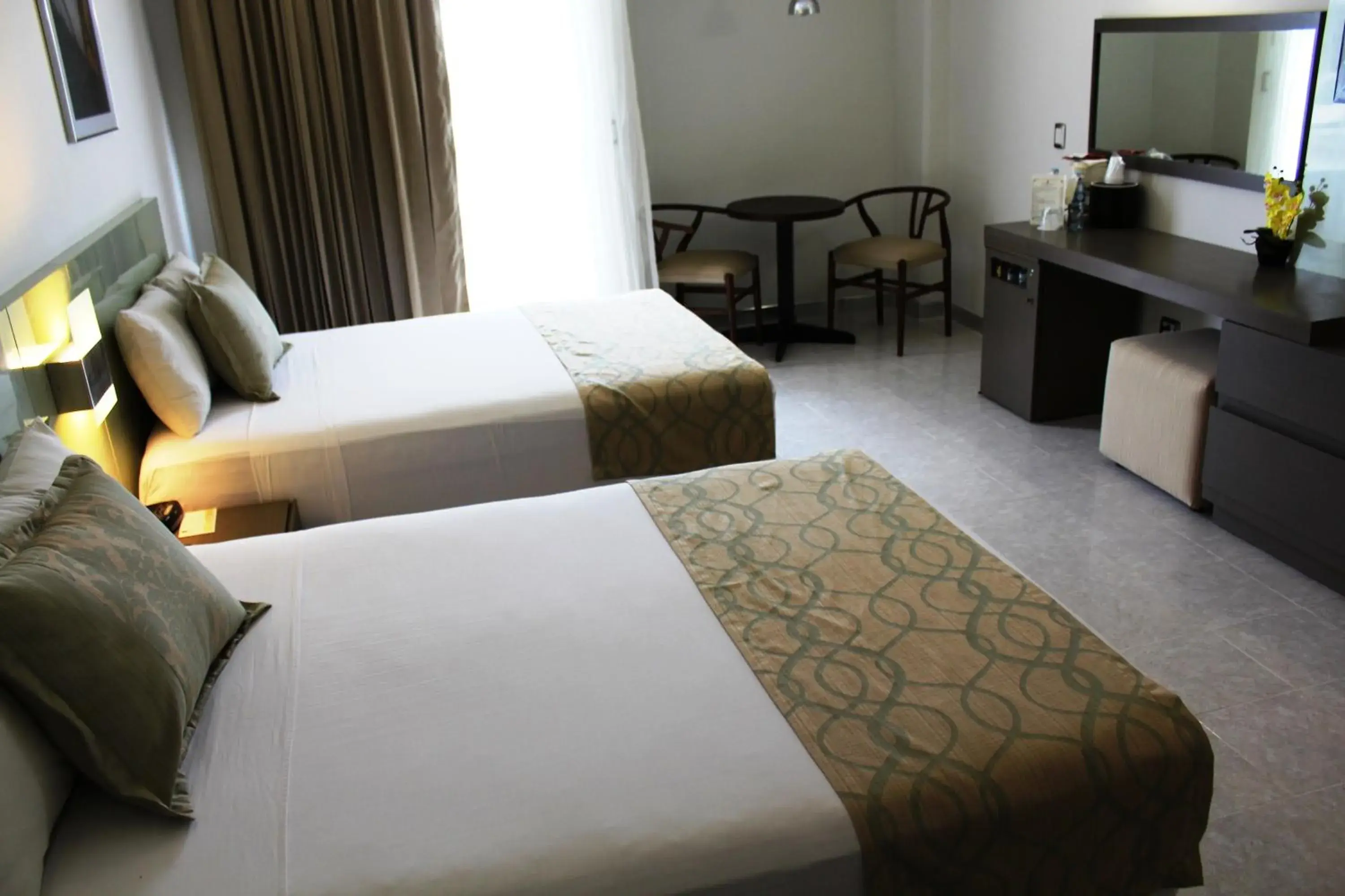 Day, Bed in Hotel El Conquistador del Paseo de Montejo Day, Bed in Hotel El Conquistador del Paseo de Montejo