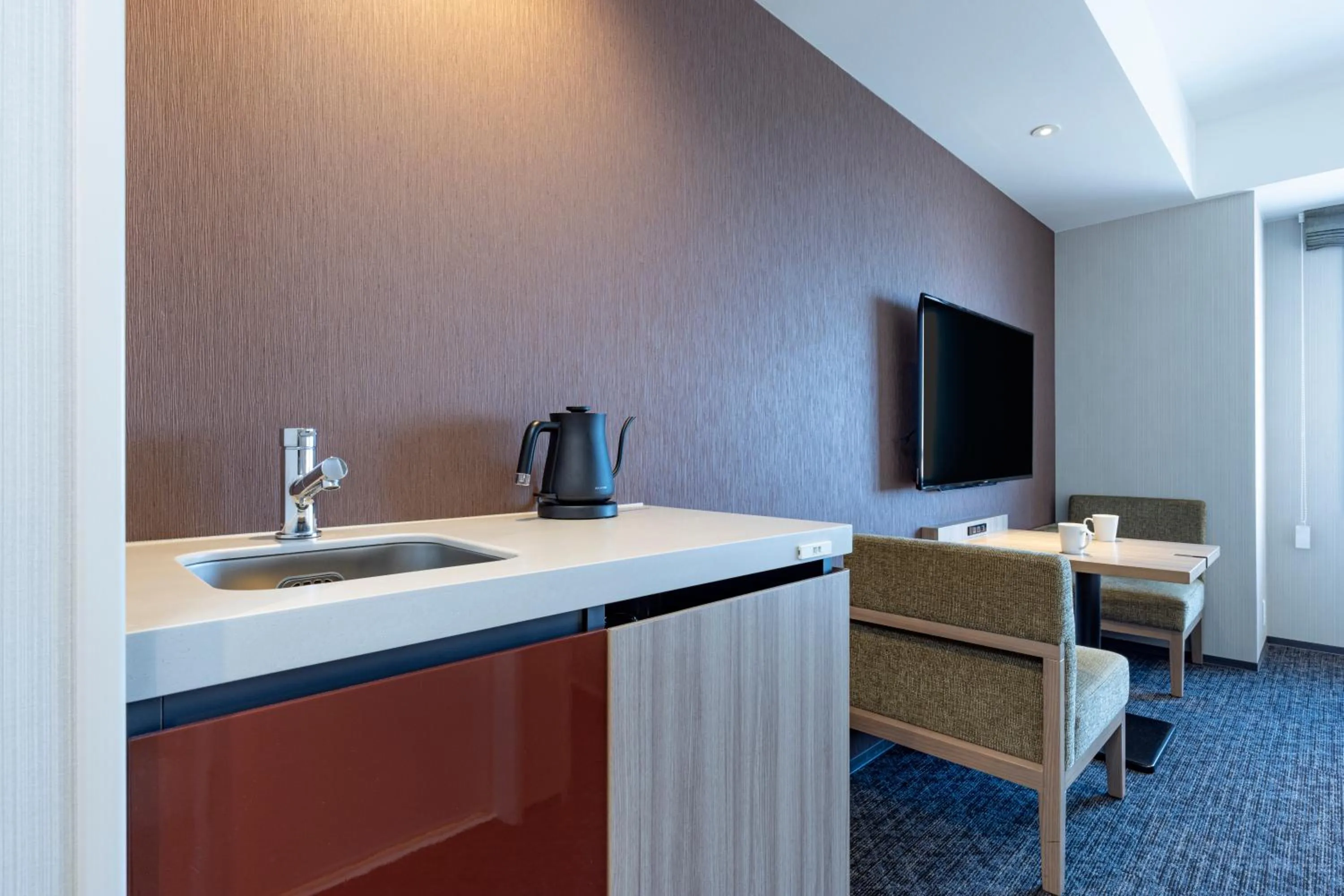 Kitchen or kitchenette in Tokyu Stay Kanazawa