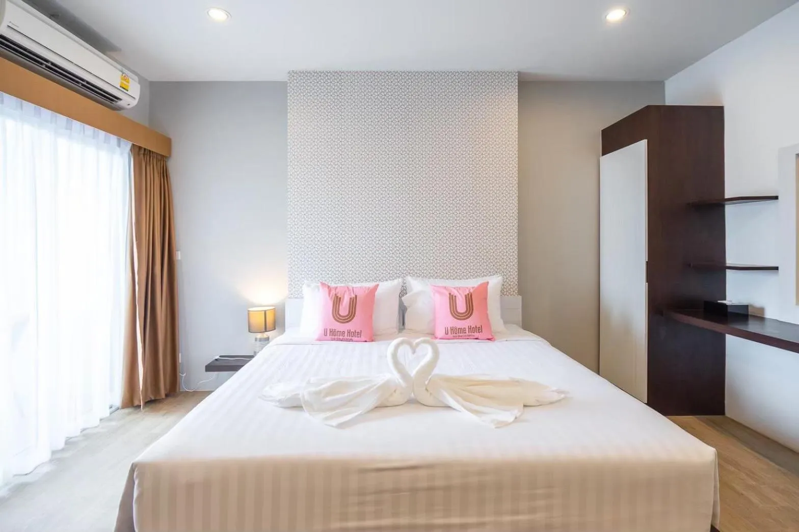Bed in U- Homehotel Nakhonpanom