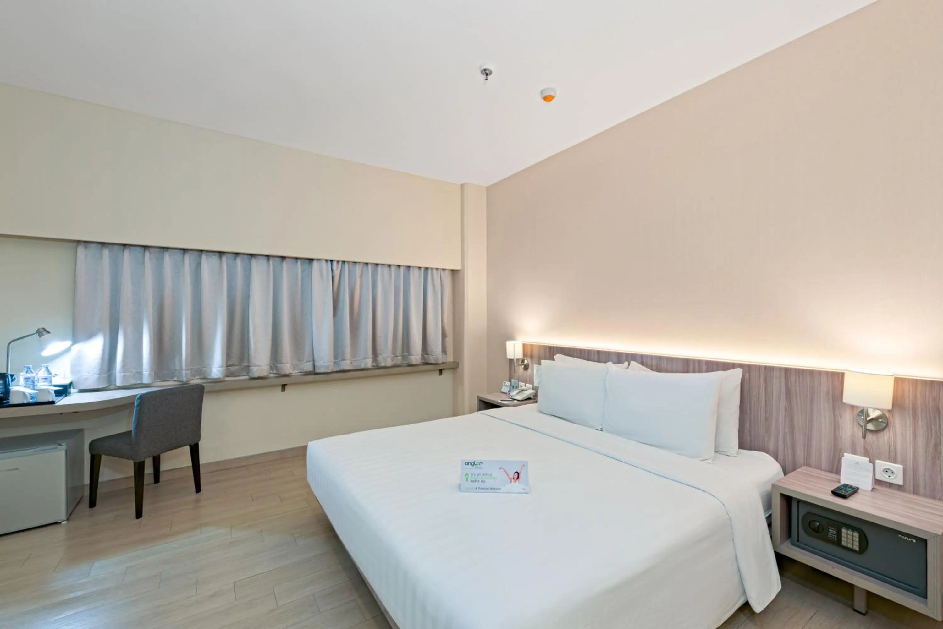 Bed in Grand Whiz Megamas Manado