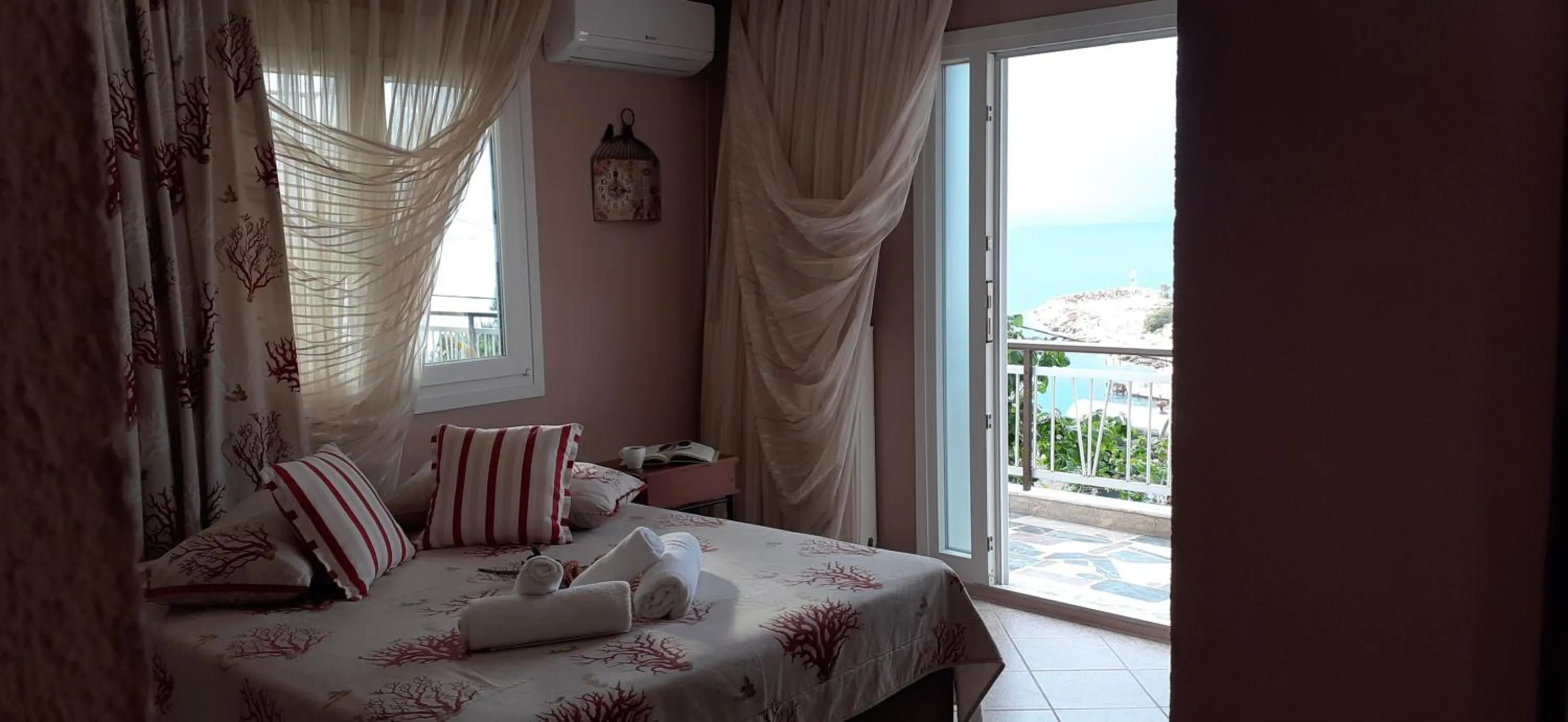 Bed in Athanasia Rooms