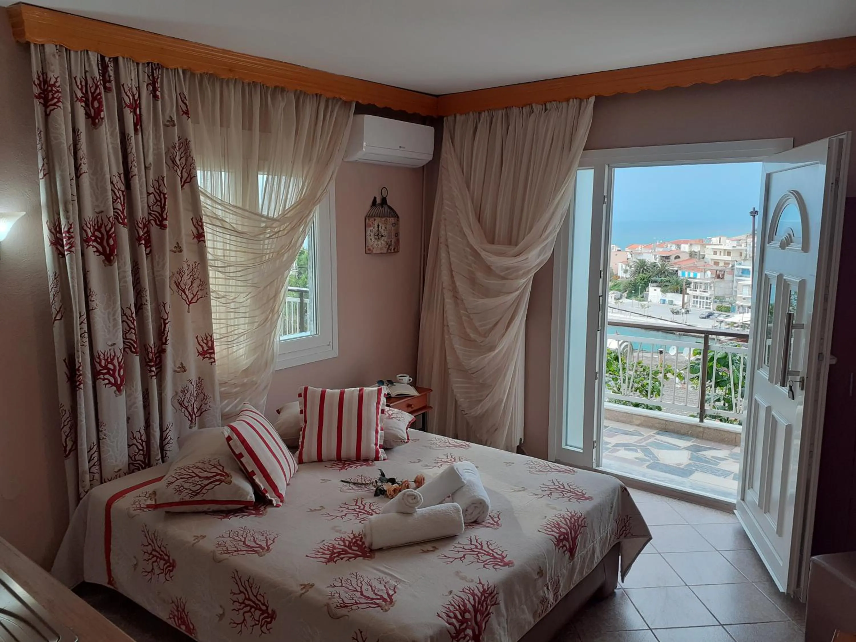 Bed in Athanasia Rooms