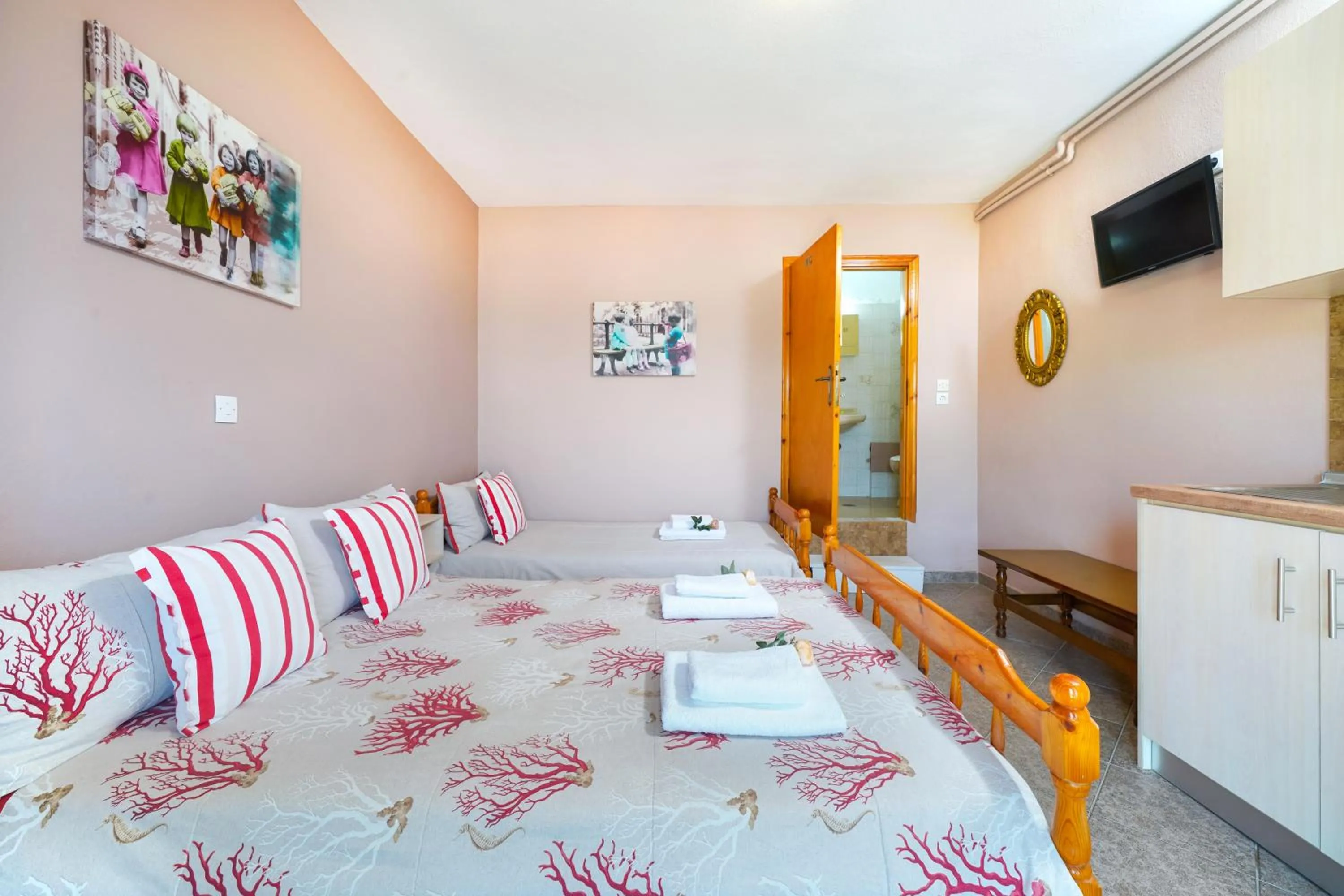 Bed in Athanasia Rooms