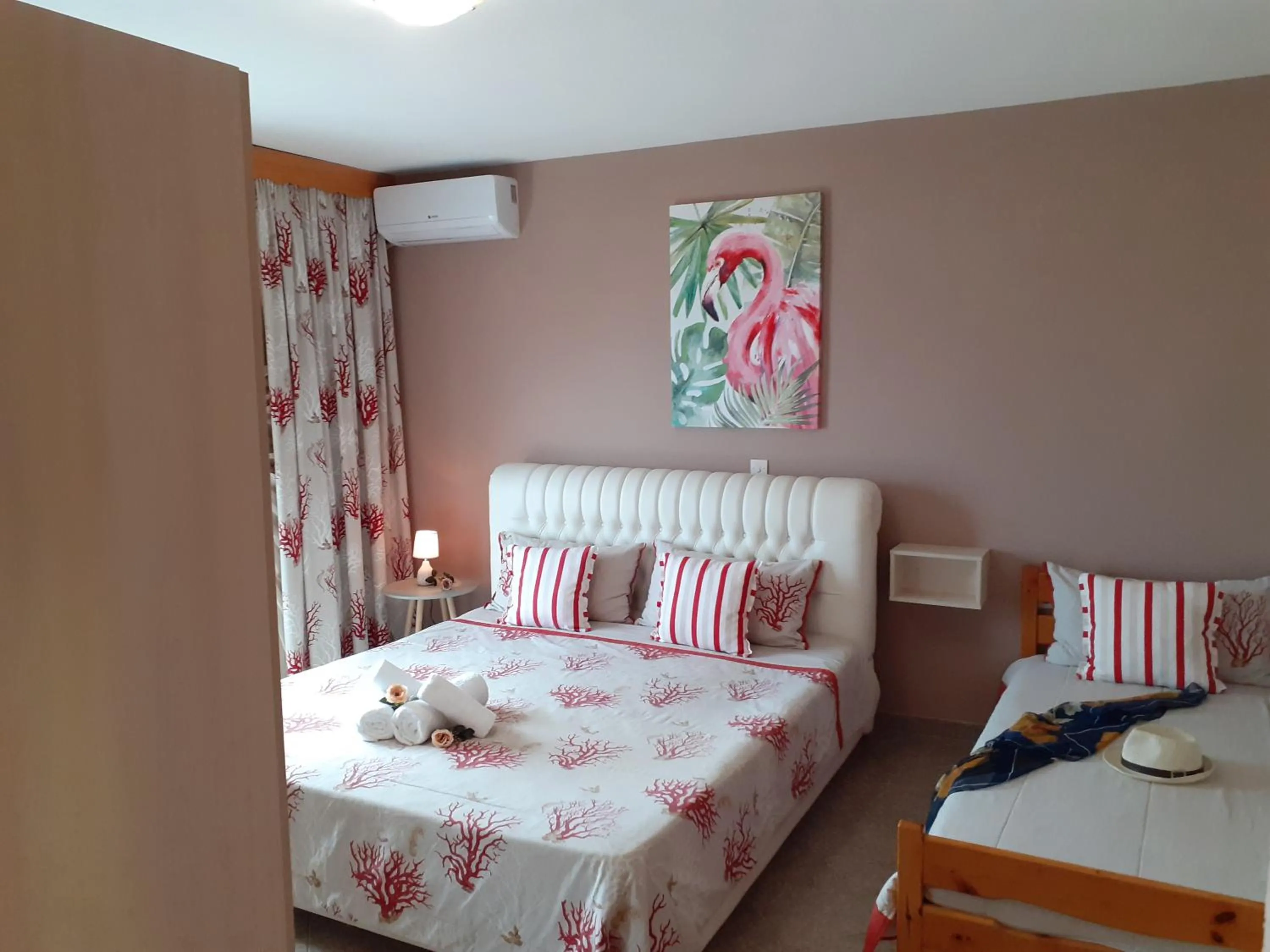 Bed in Athanasia Rooms