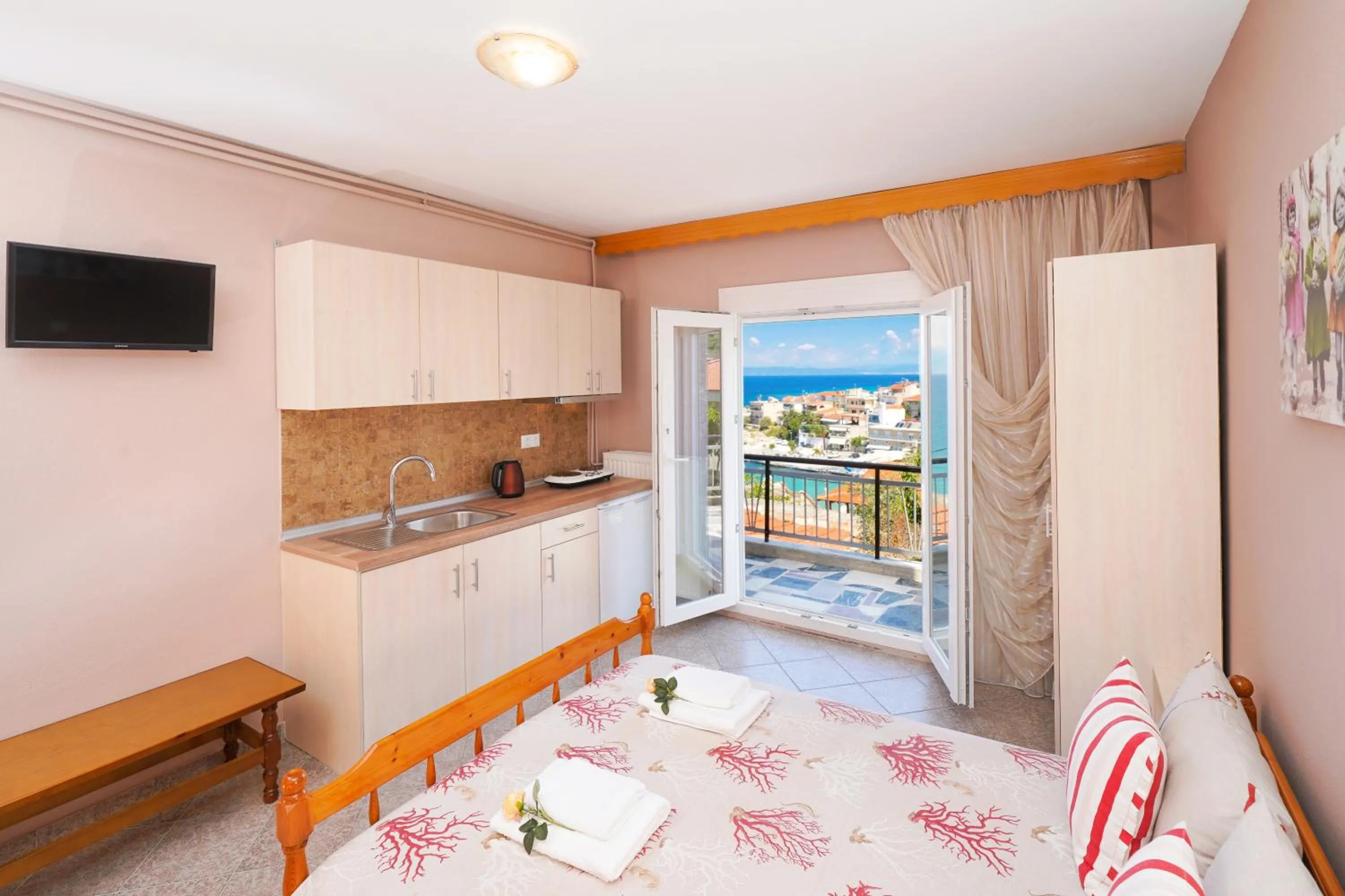 Kitchen or kitchenette in Athanasia Rooms