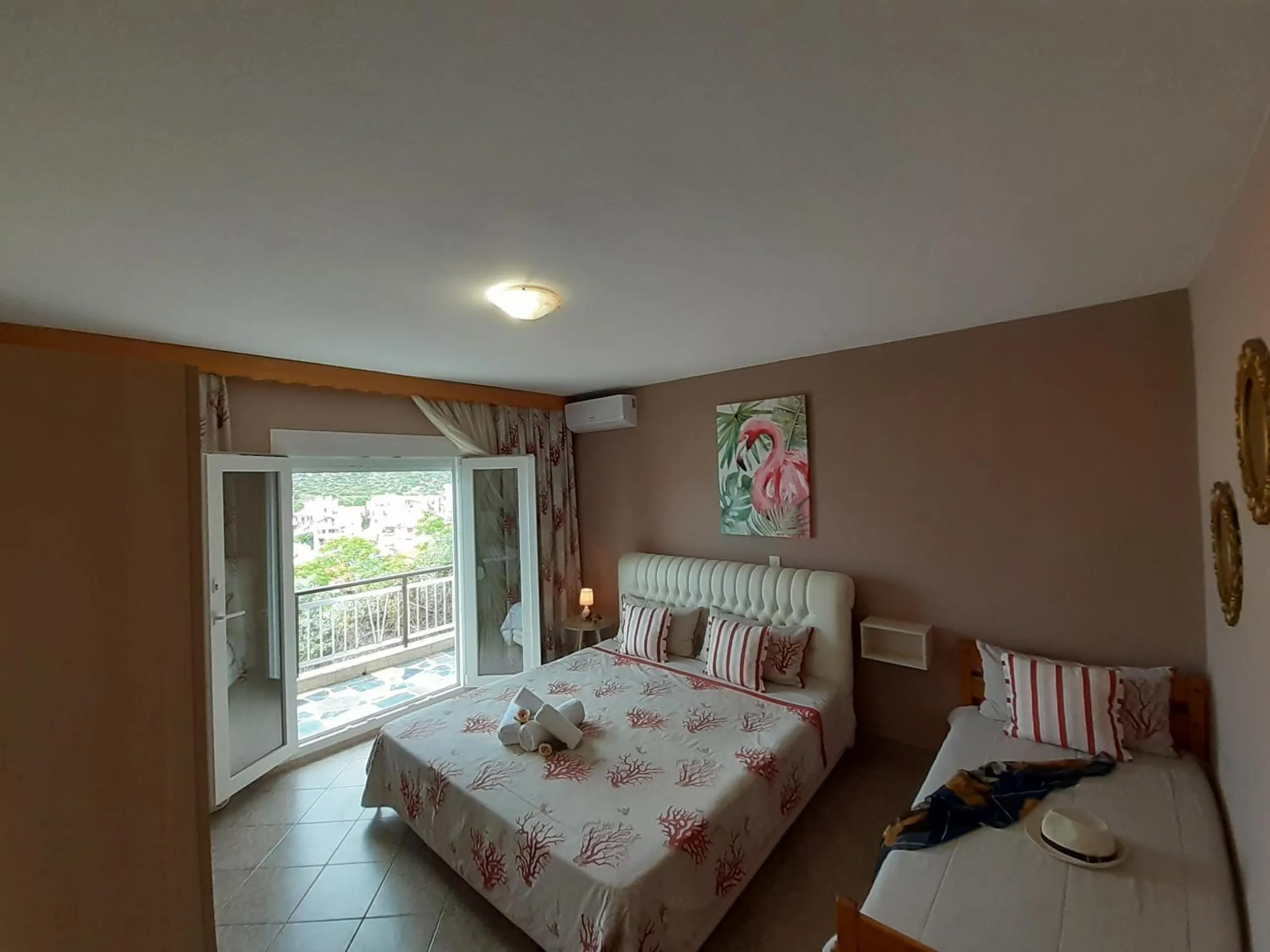 Bed in Athanasia Rooms