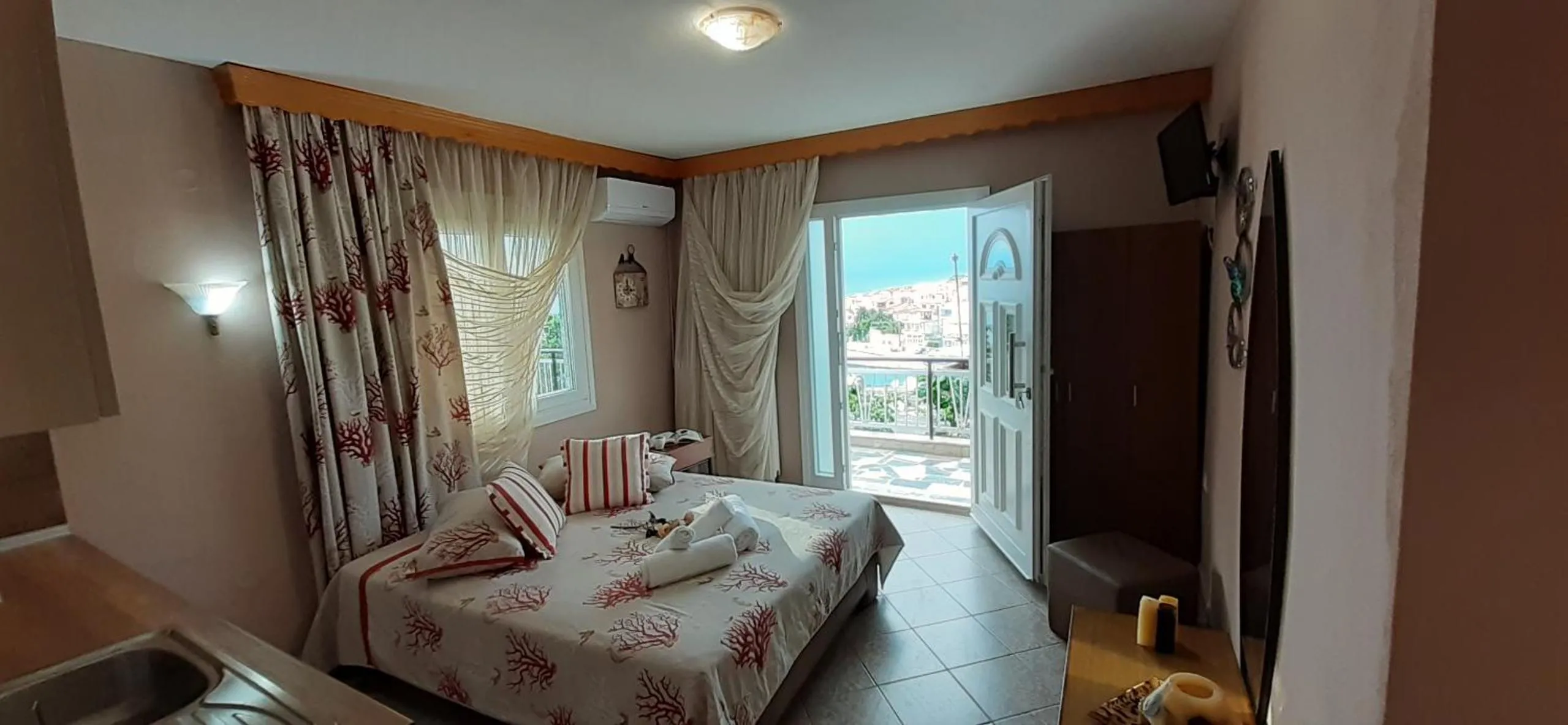Bed in Athanasia Rooms