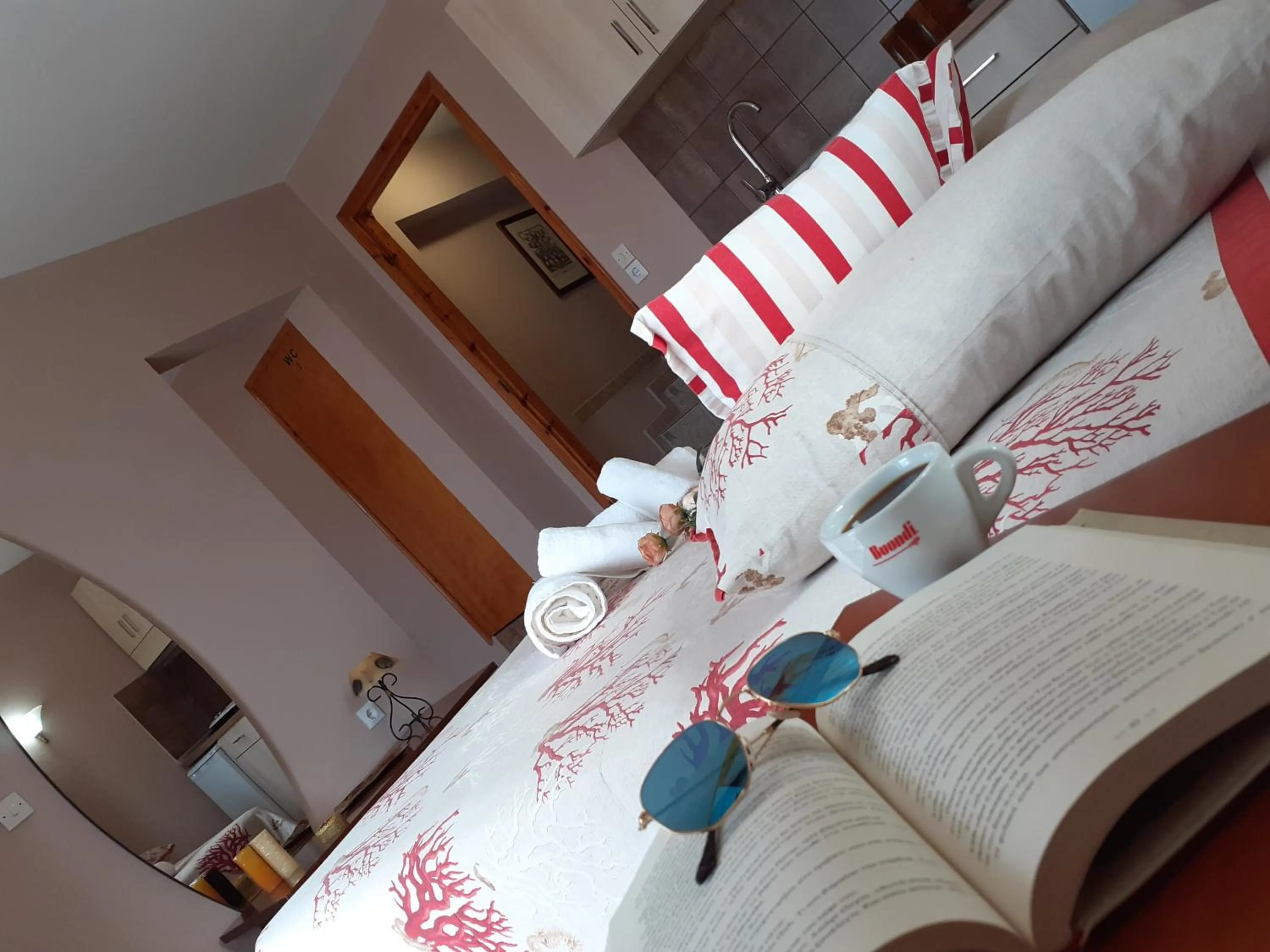 Bed in Athanasia Rooms