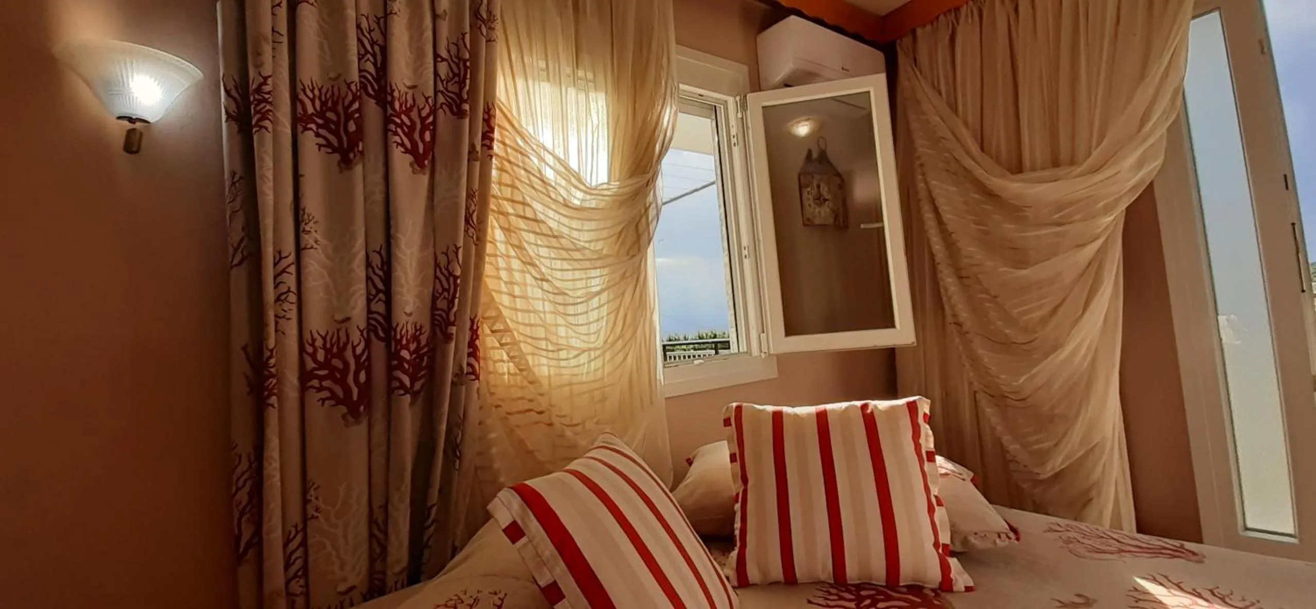 Bed in Athanasia Rooms