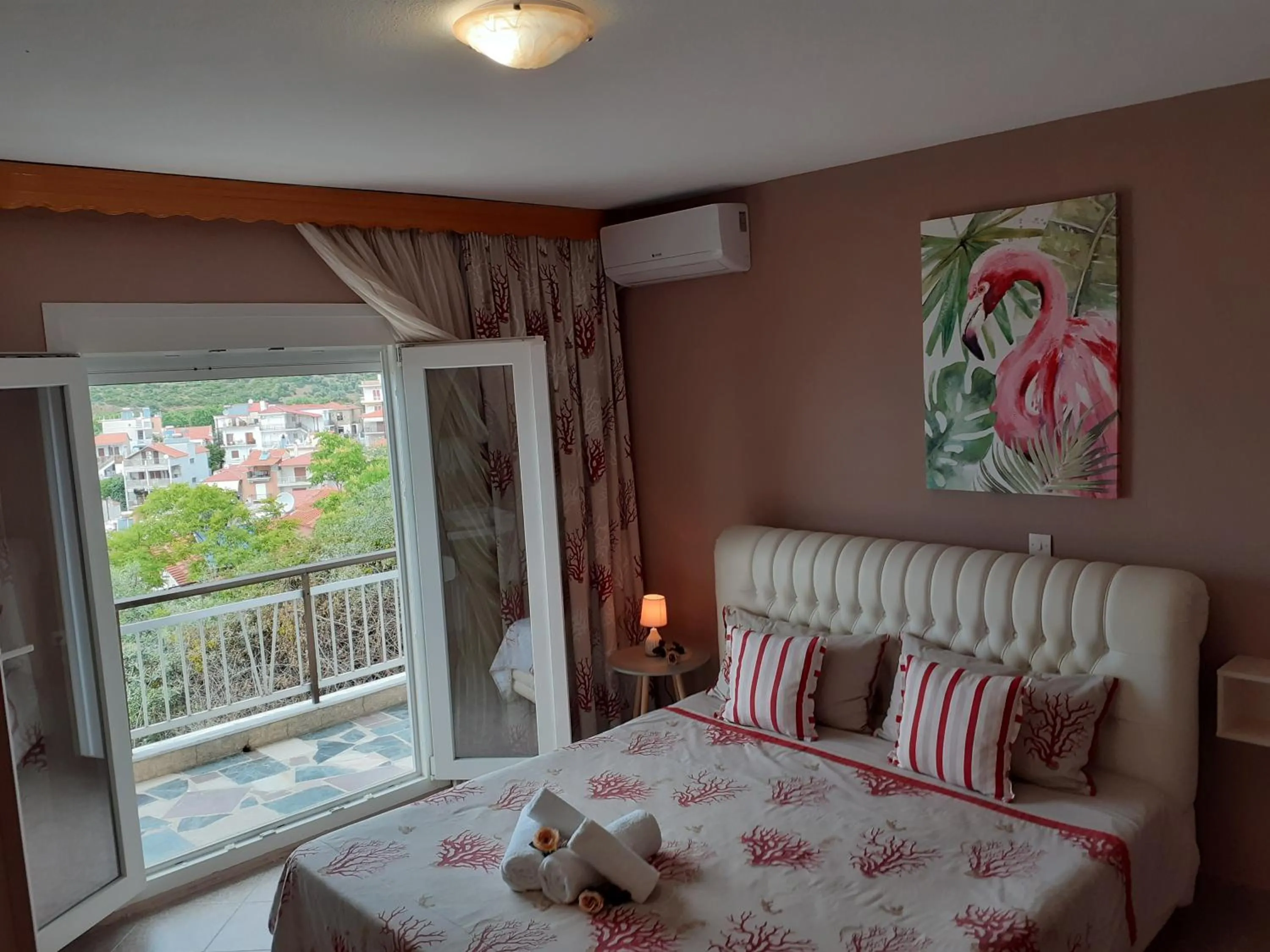 Bed in Athanasia Rooms