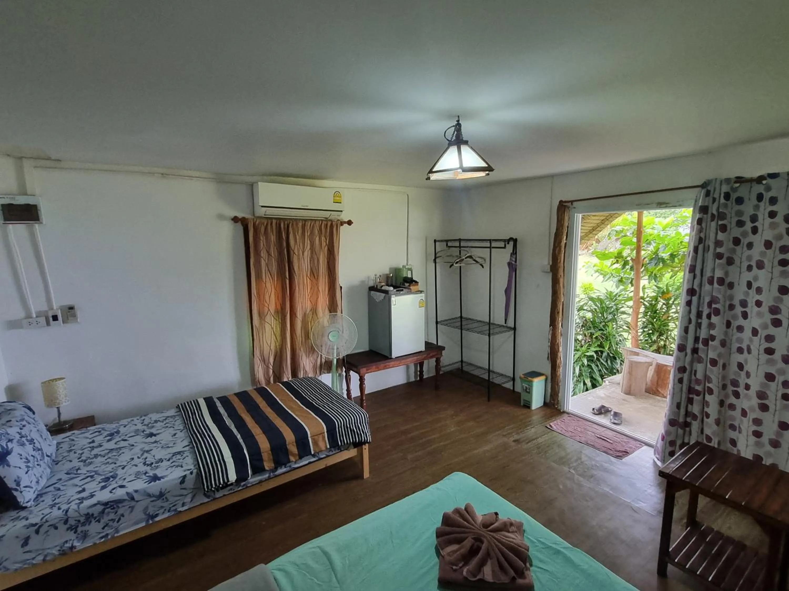 Bed in TK Beach Resort Koh Mak